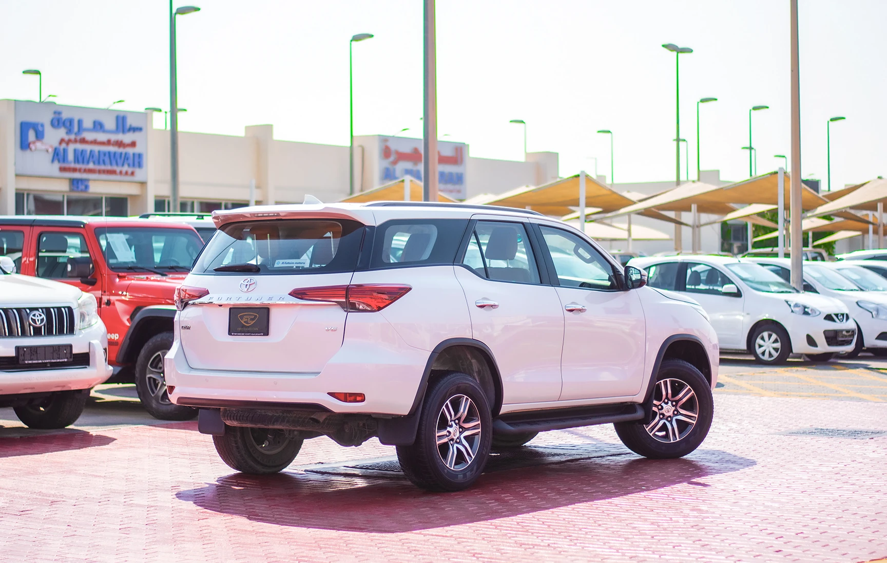 Used 2019 Toyota Fortuner GXR in White – Right Back Diagonal (45°) View for Sale at First Choice Cars Dubai Sharjah