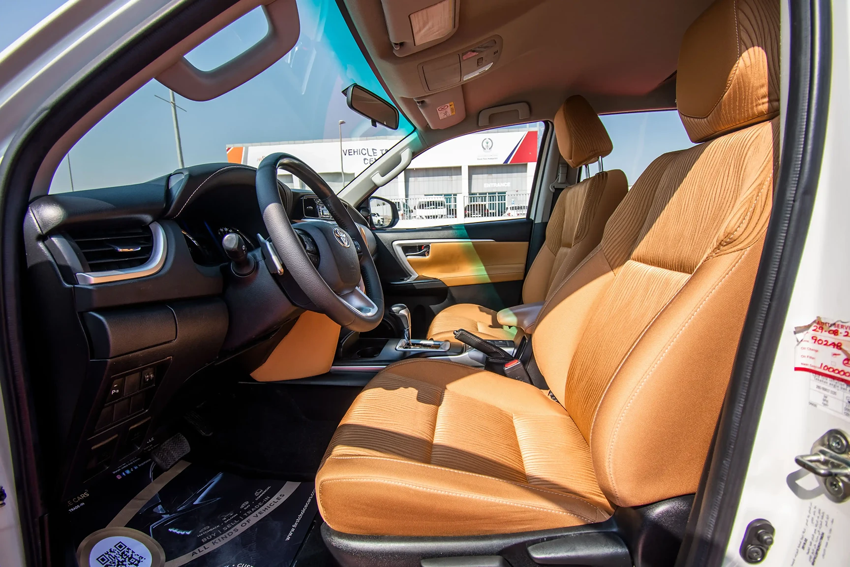 Used 2019 Toyota Fortuner GXR in White – Front Driver Side Cabin View for Sale at First Choice Cars Dubai Sharjah