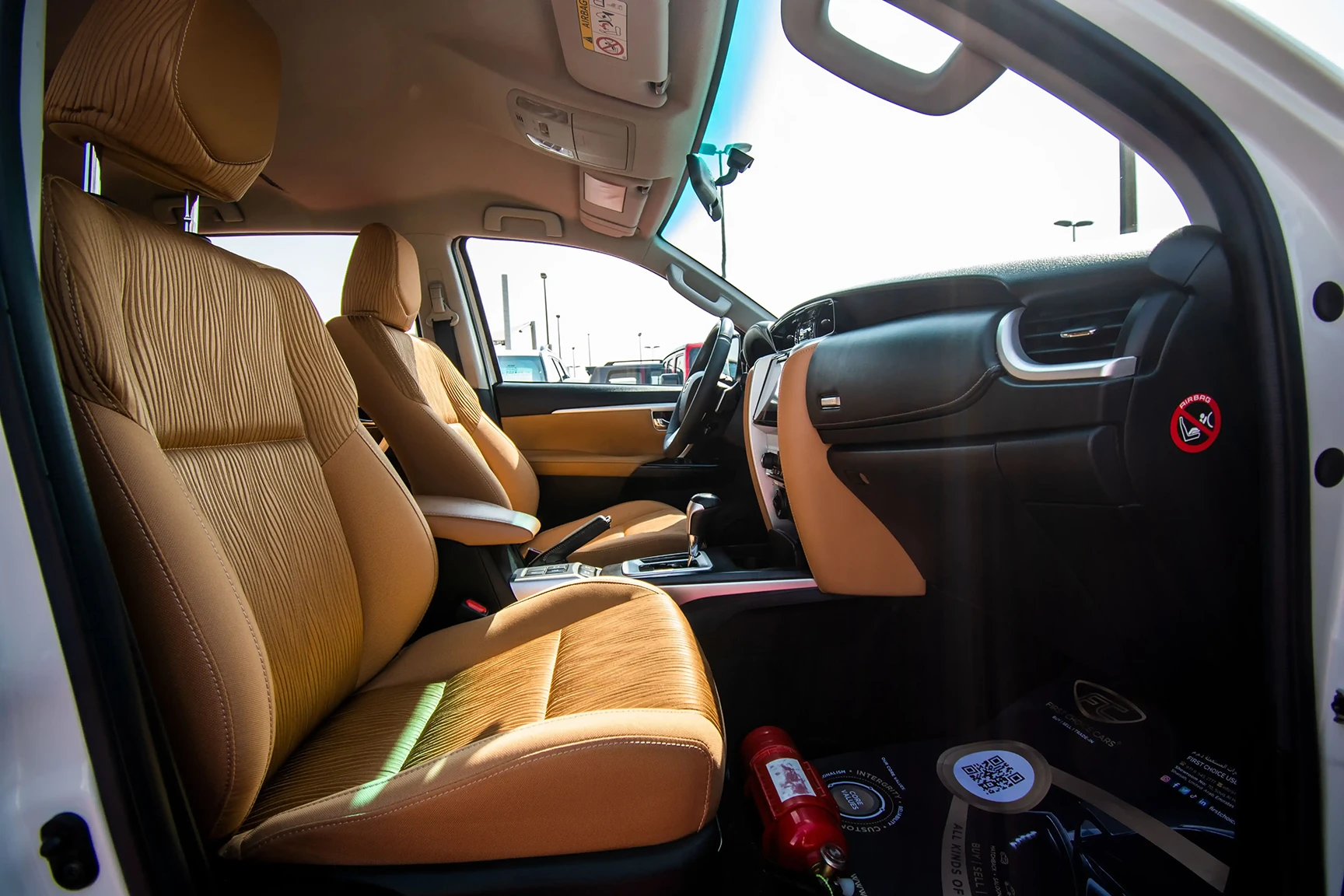 Used 2019 Toyota Fortuner GXR in White – Front Passenger Side Cabin View for Sale at First Choice Cars Dubai Sharjah