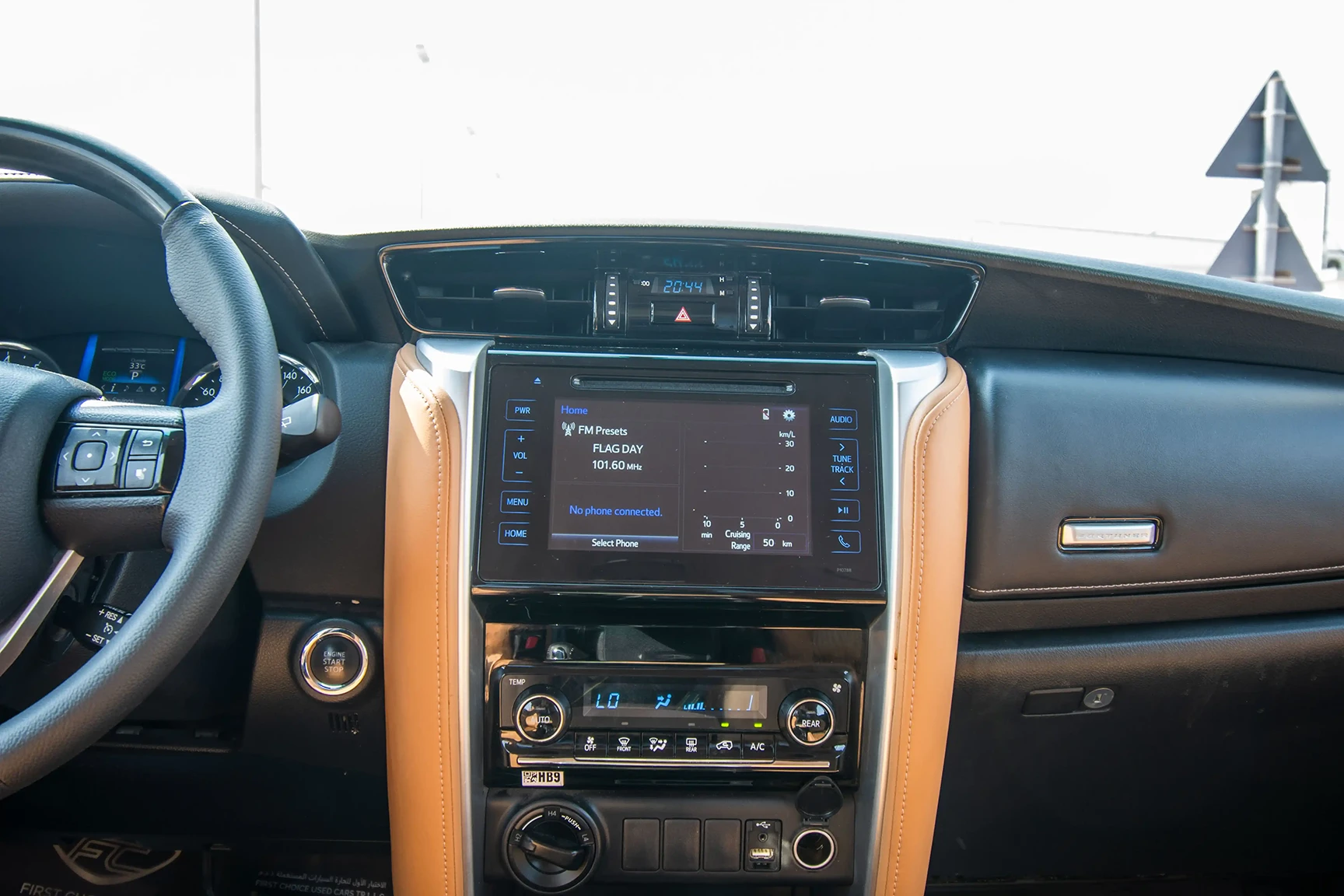 Used 2019 Toyota Fortuner GXR in White – Infotainment / Touchscreen System for Sale at First Choice Cars Dubai Sharjah