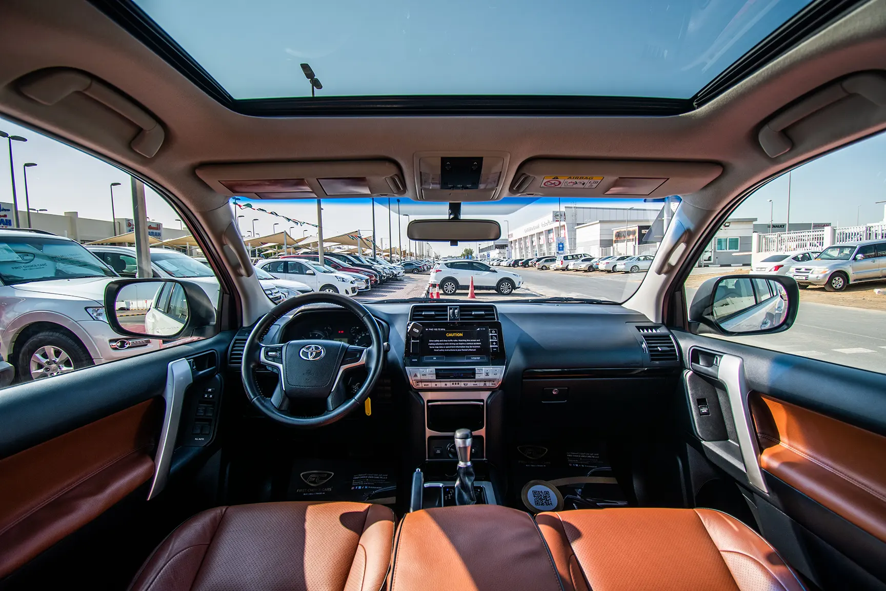Used 2018 Toyota Prado VXR White – Front Cabin / Dashboard Full View at First Choice Cars Sharjah