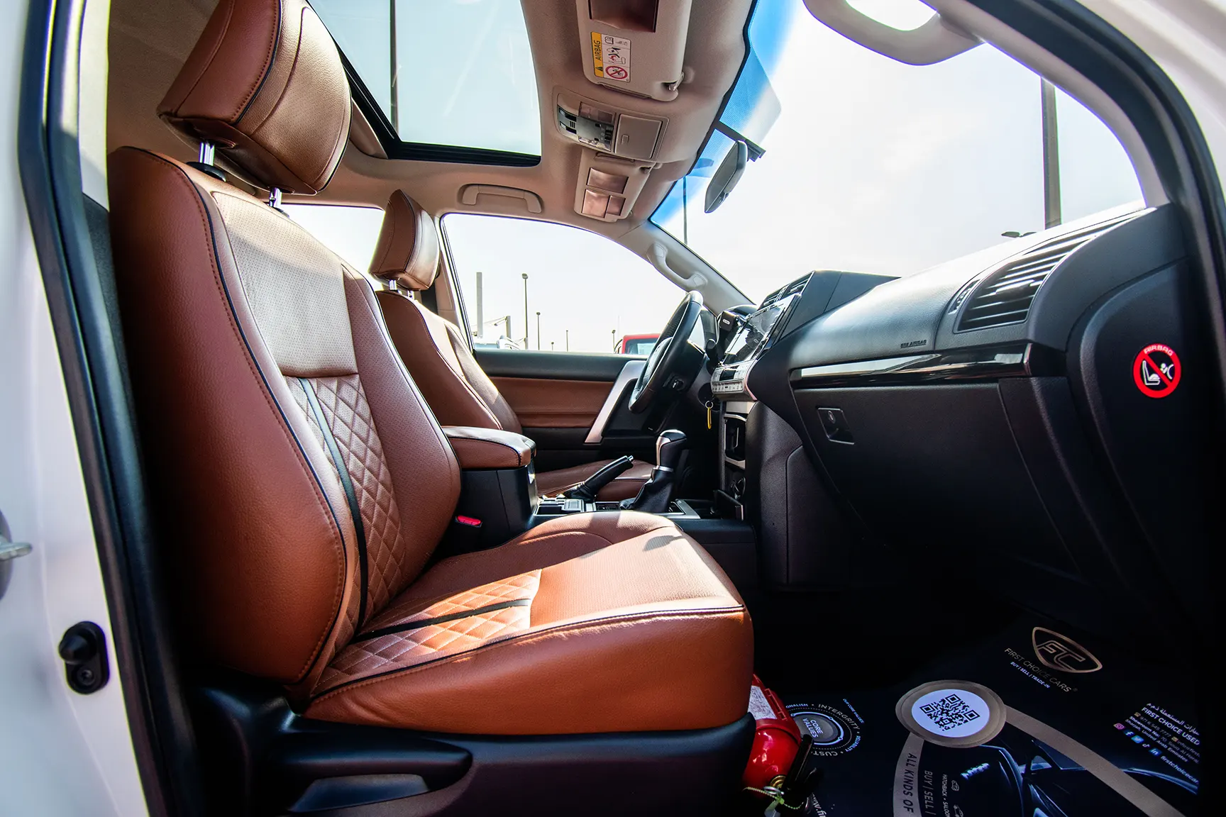 Used 2018 Toyota Prado VXR White – Front Passenger Side Cabin View at First Choice Cars Sharjah