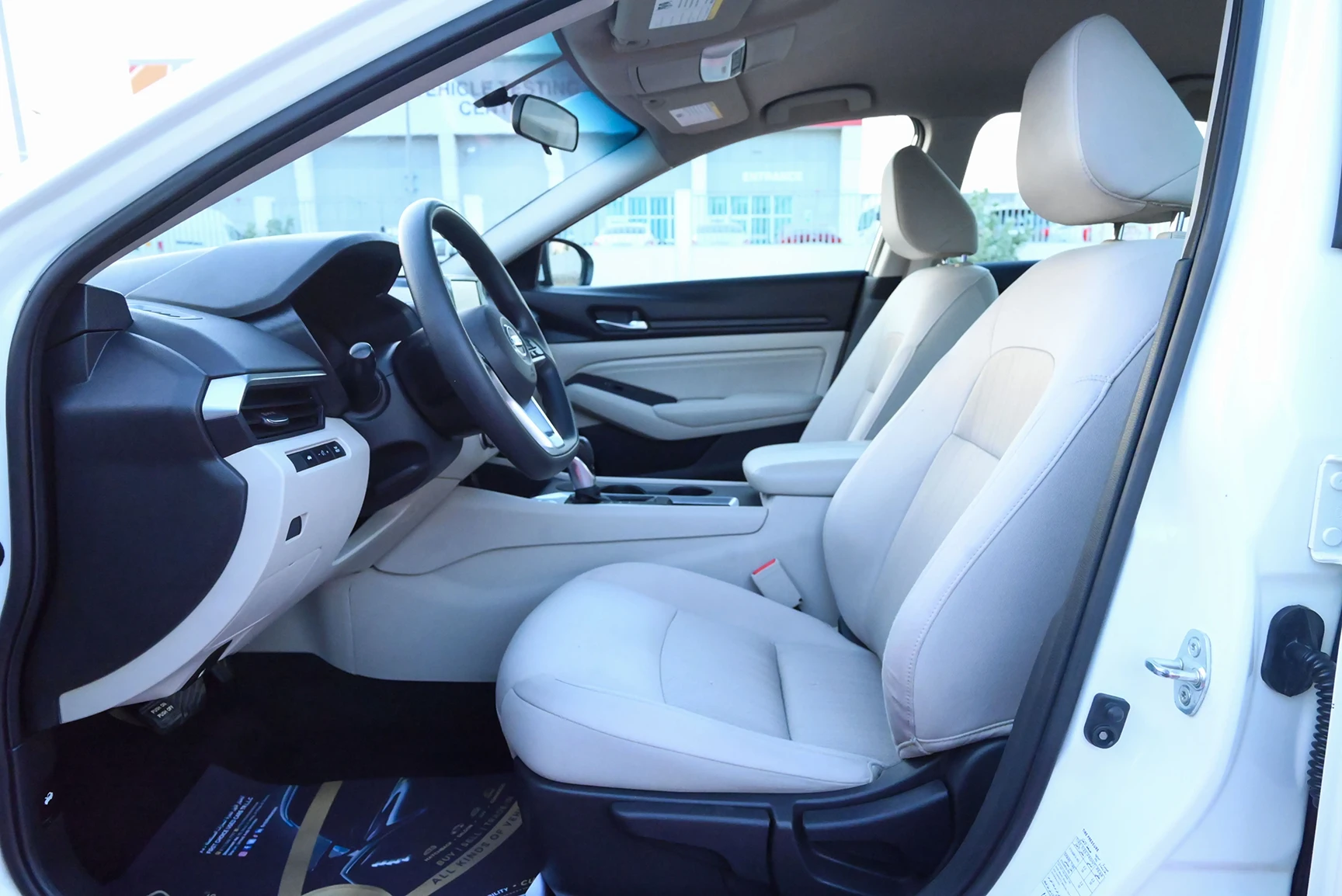 Used 2019 Nissan Altima S White – Front Driver Side Cabin View at First Choice Cars Sharjah