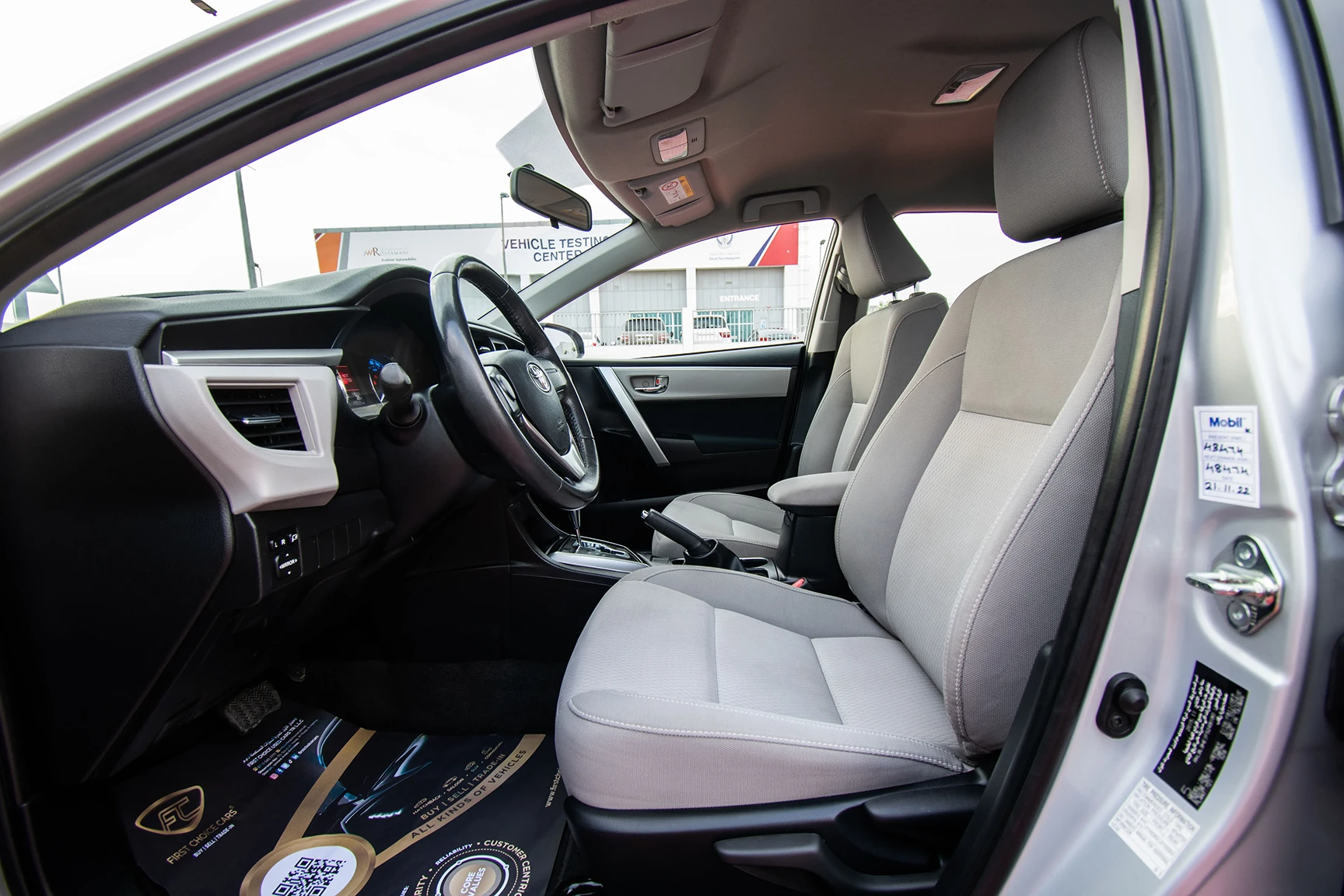 Used 2015 Toyota Corolla Se Silver – Front Driver Side Cabin View at First Choice Cars Sharjah