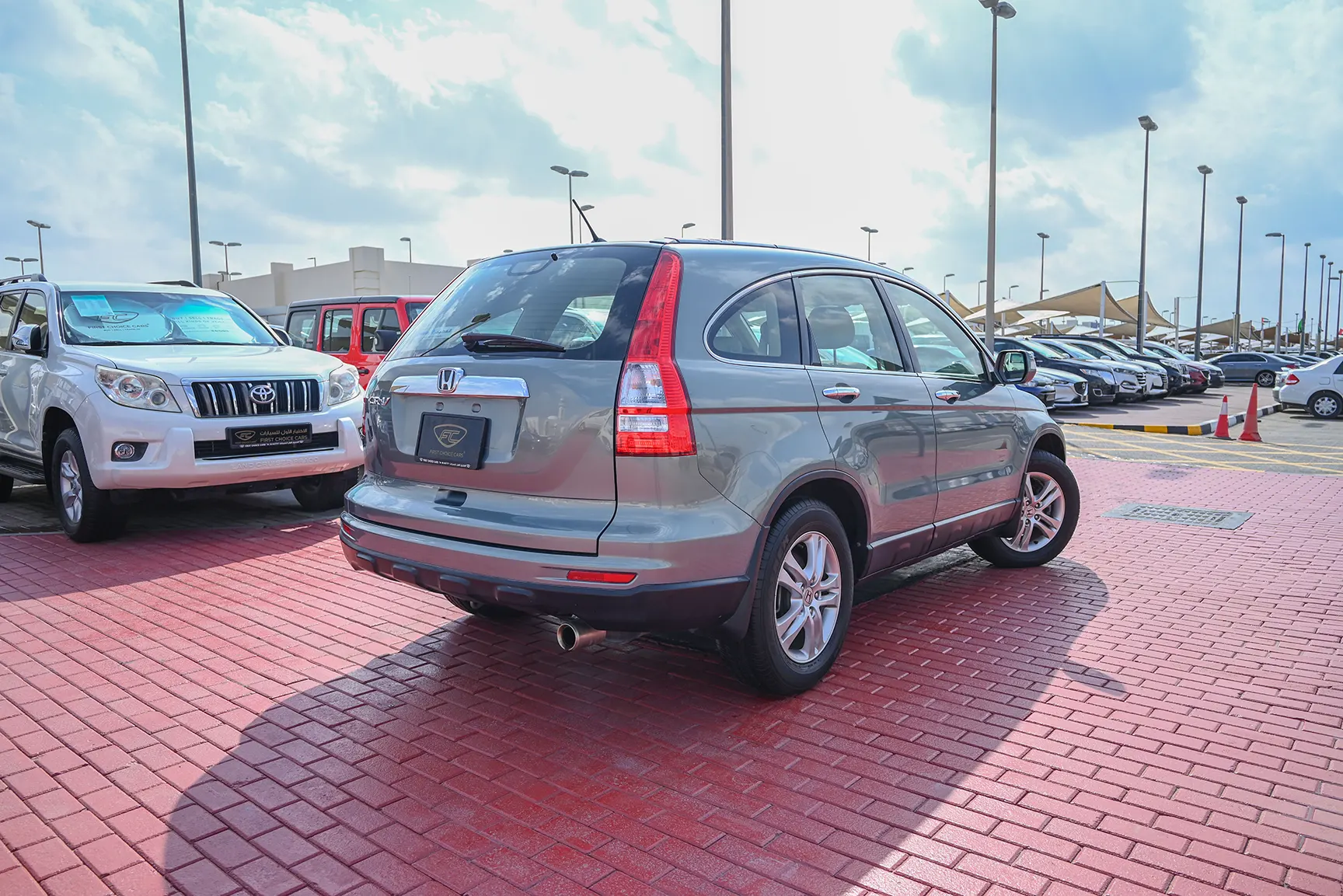 Used 2011 Honda CR-V EXL in Silver – Right Back Diagonal (45°) View for Sale at First Choice Cars Dubai Sharjah