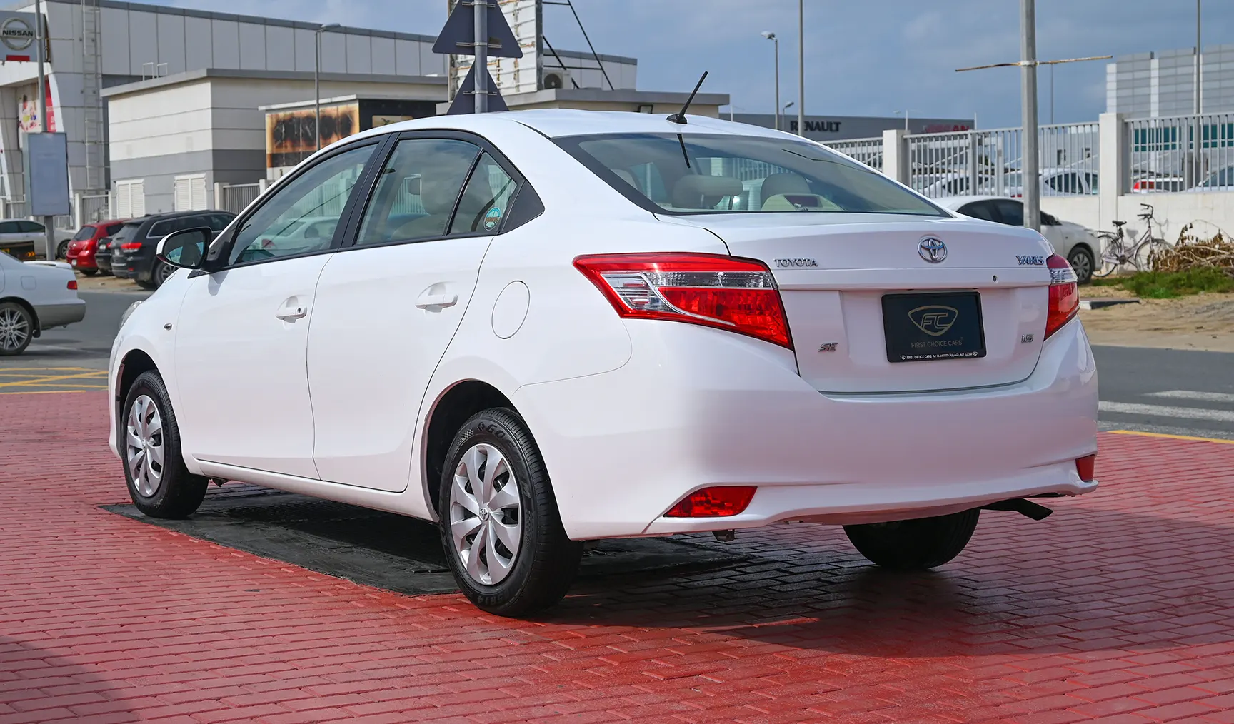 Used 2017 Toyota Yaris Se White – Left Back Diagonal (45°) View at First Choice Cars Sharjah