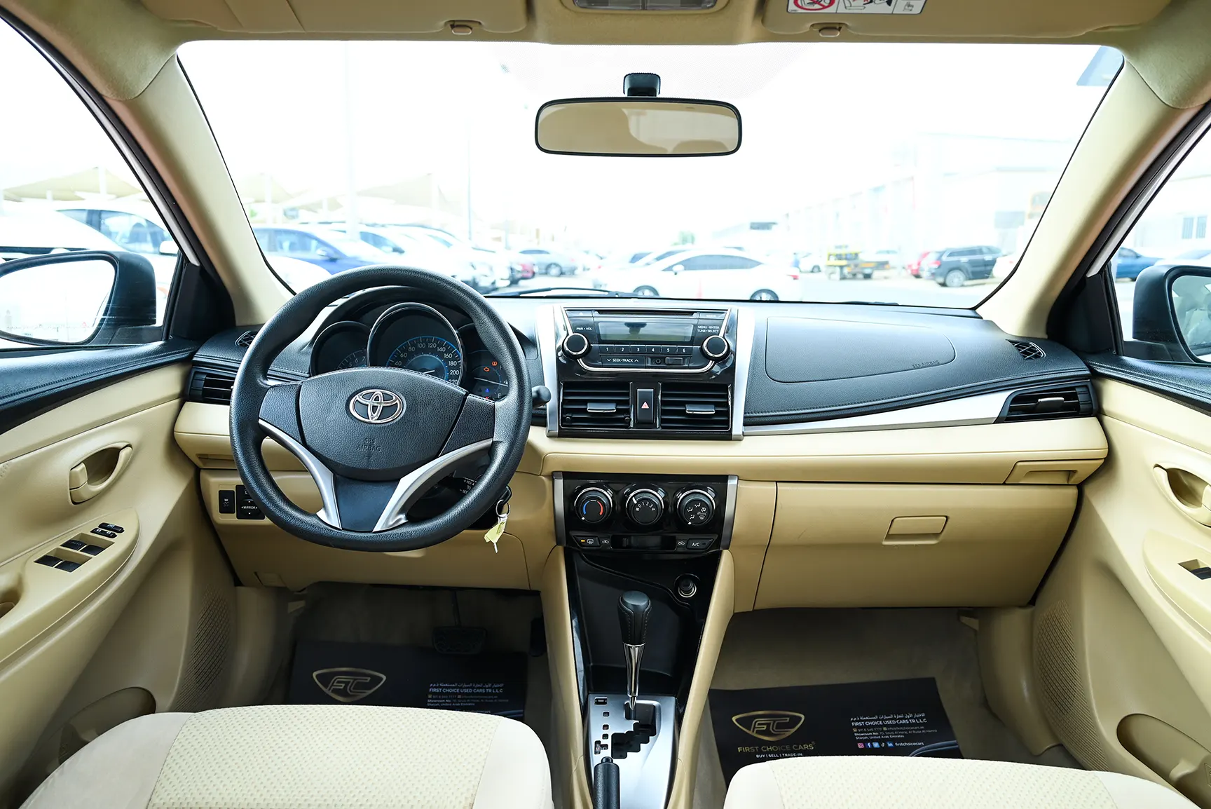 Used 2017 Toyota Yaris Se White – Front Cabin / Dashboard Full View at First Choice Cars Sharjah
