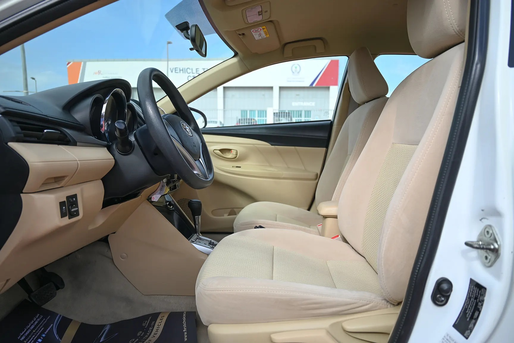 Used 2017 Toyota Yaris Se White – Front Driver Side Cabin View at First Choice Cars Sharjah