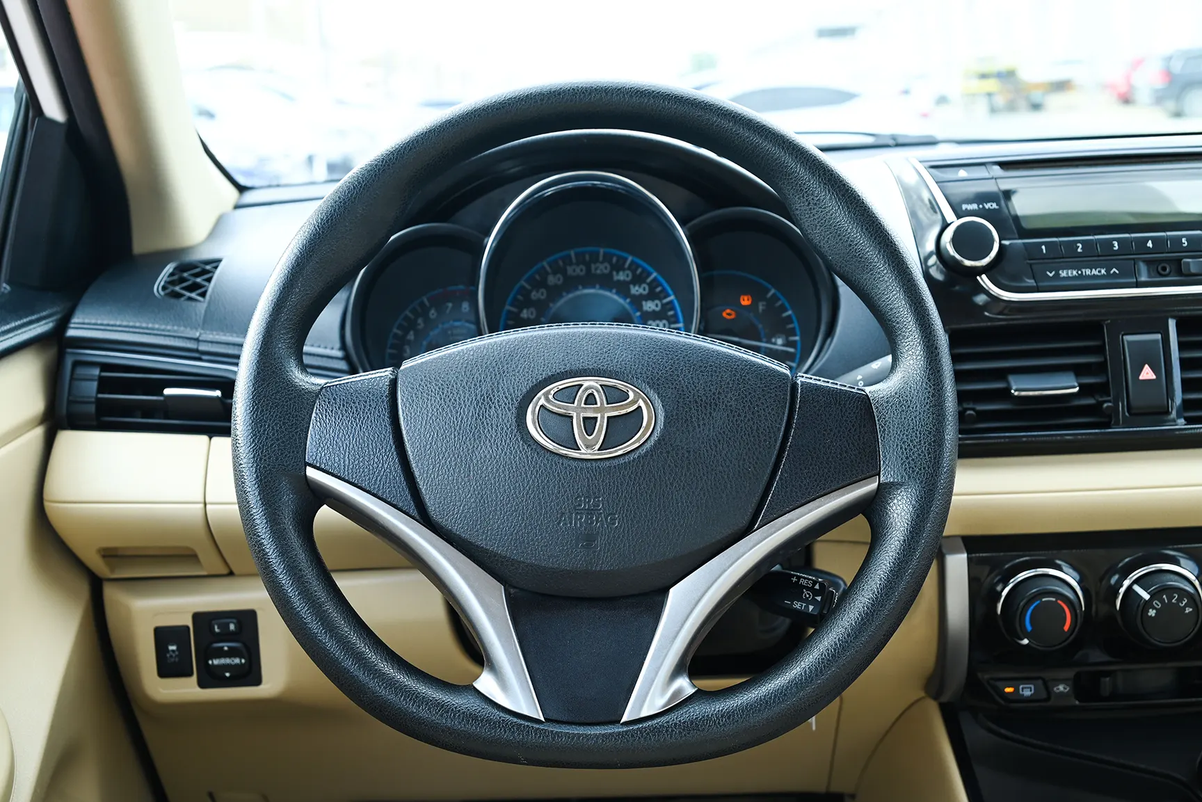 Used 2017 Toyota Yaris Se White – Driver Side Dashboard & Steering View at First Choice Cars Sharjah