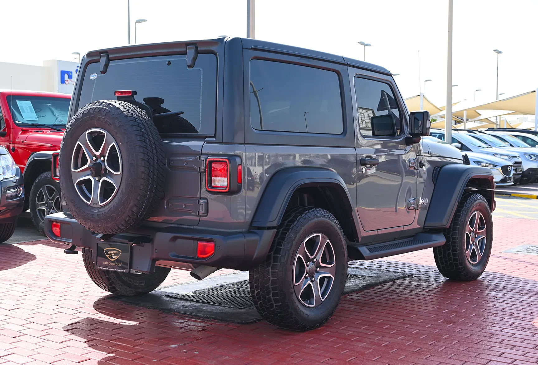 Used 2021 Jeep Wrangler Sport Grey – Right Back Diagonal (45°) View at First Choice Cars Sharjah