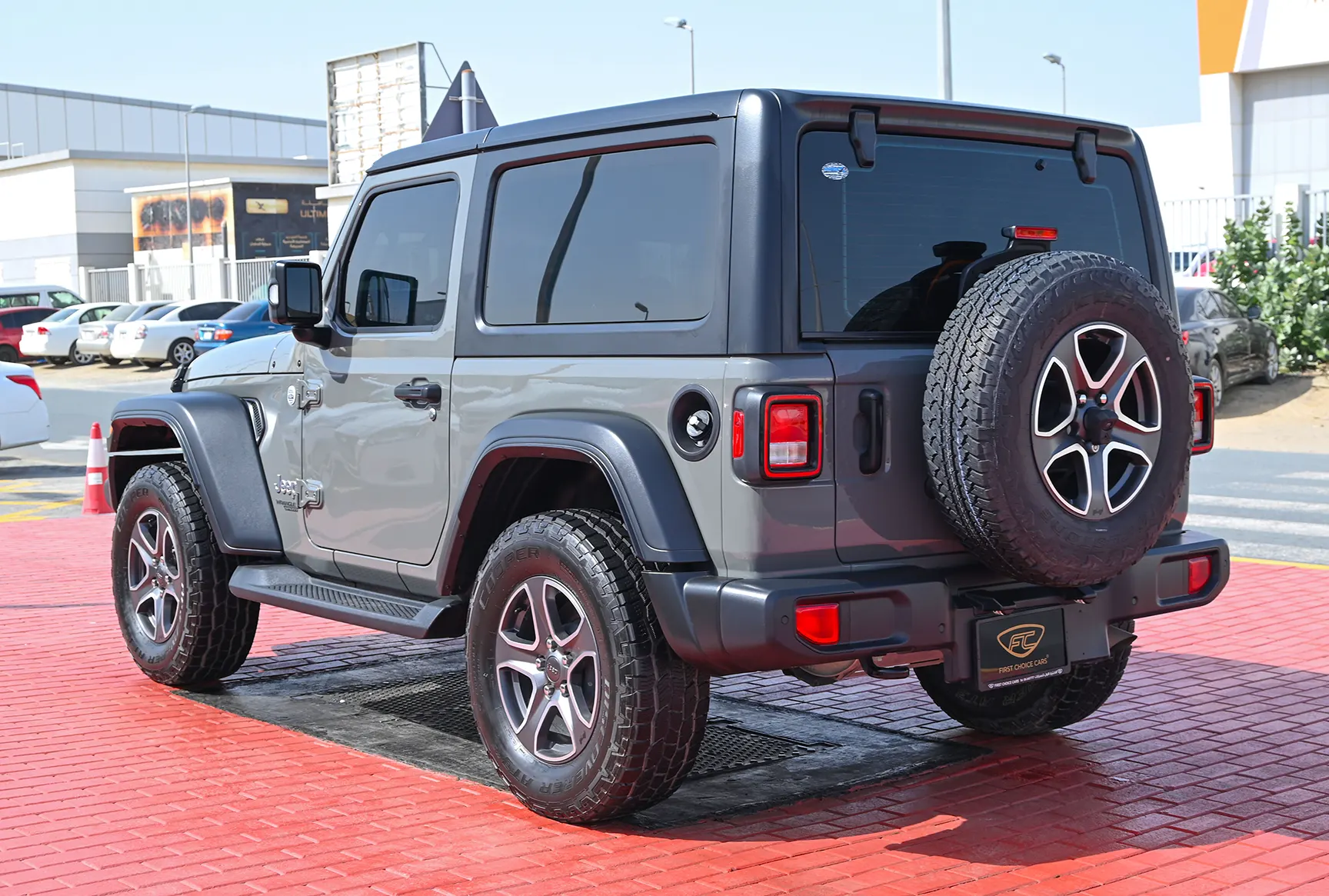 Used 2021 Jeep Wrangler Sport Grey – Right Back Diagonal (45°) View at First Choice Cars Sharjah