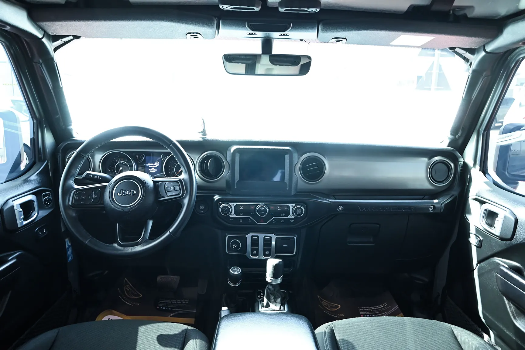 Used 2021 Jeep Wrangler Sport Grey – Front Cabin / Dashboard Full View at First Choice Cars Sharjah