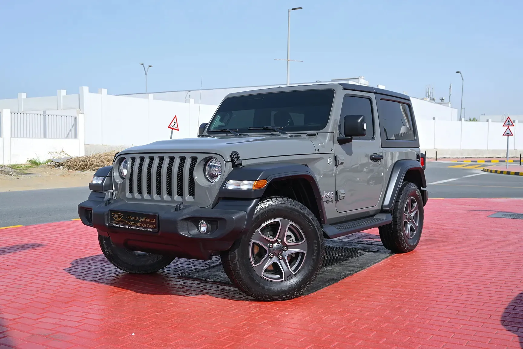 Used 2021 Jeep Wrangler Sport Grey – Left Front Diagonal (45°) View at First Choice Cars Sharjah
