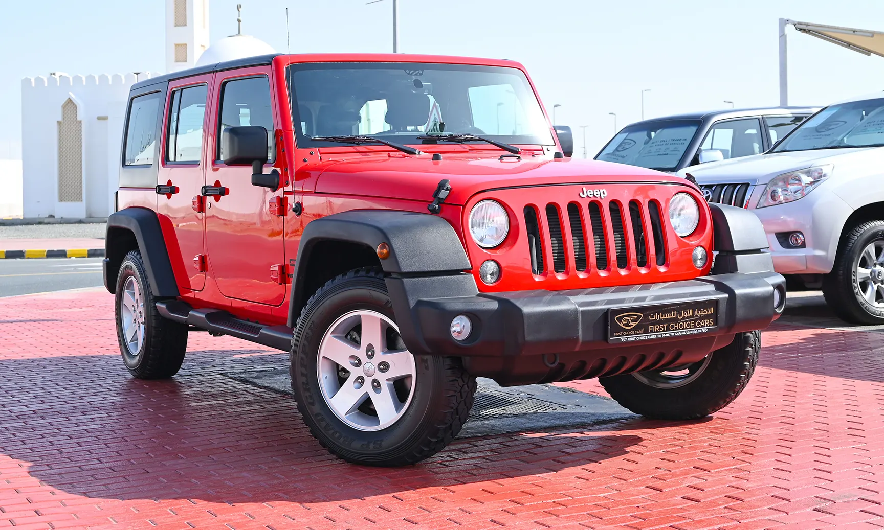 Used 2016 Jeep Wrangler Unlimited Sport Red – Right Front Diagonal (45°) View at First Choice Cars Sharjah