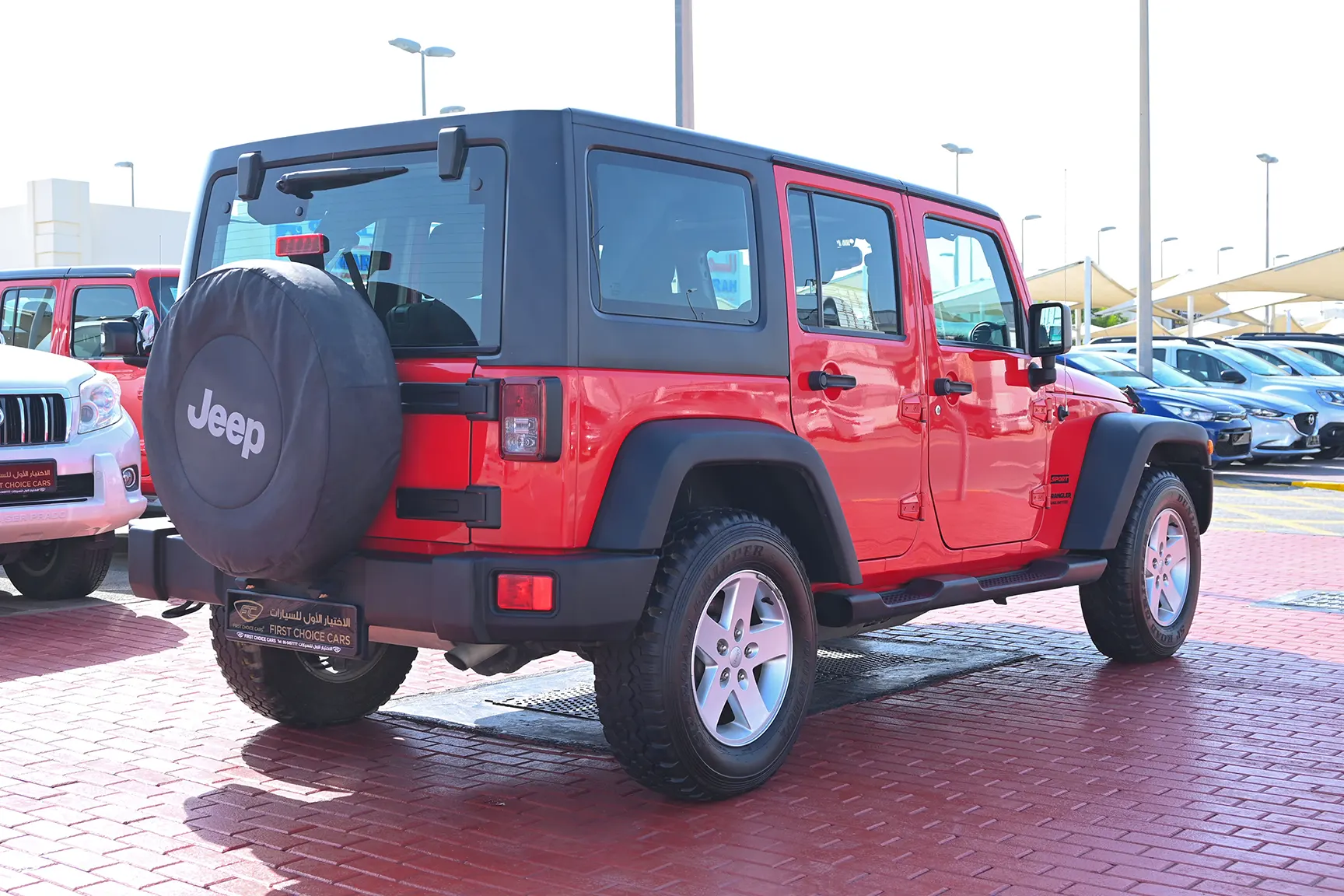 Used 2016 Jeep Wrangler Unlimited Sport Red – Right Back Diagonal (45°) View at First Choice Cars Sharjah