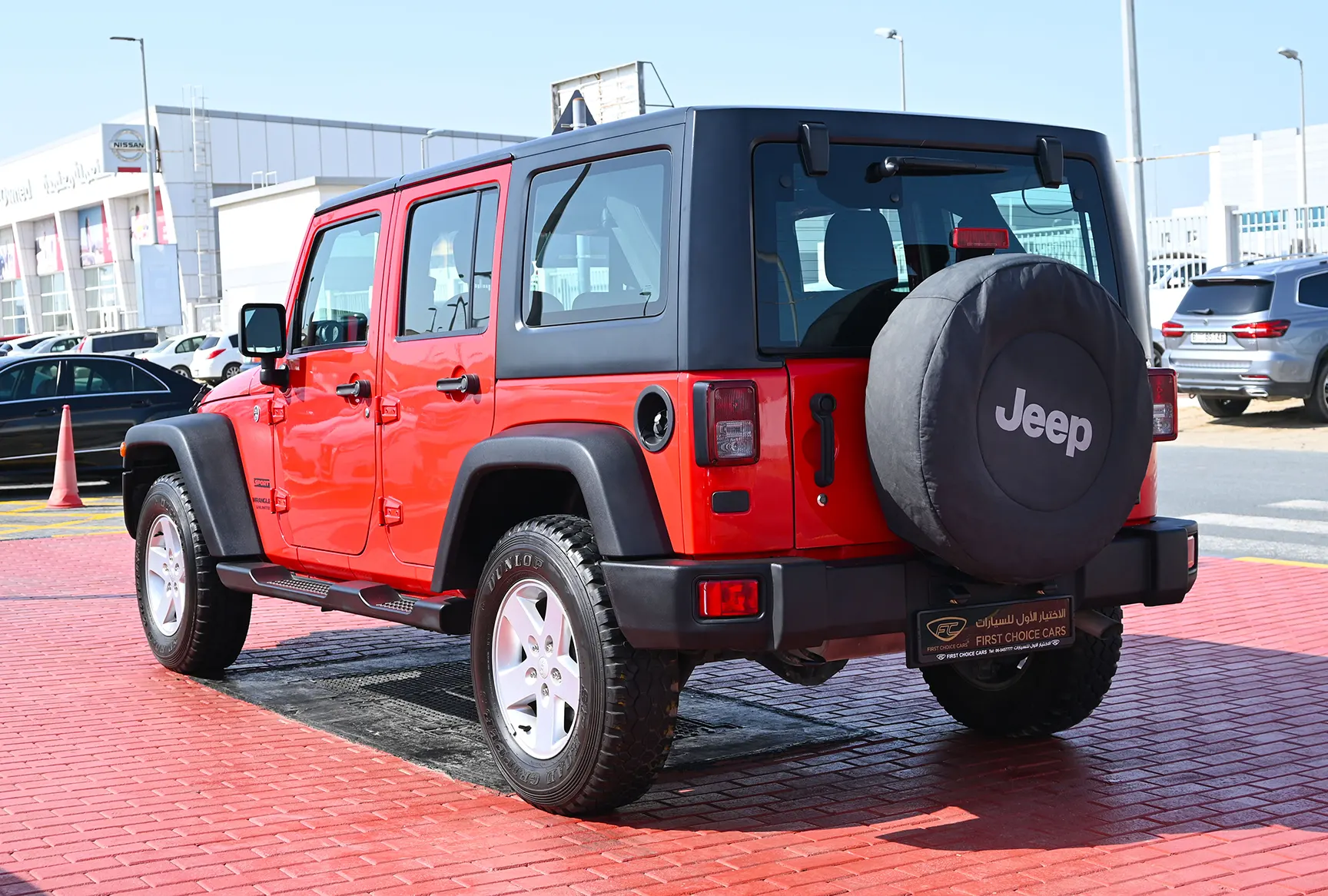 Used 2016 Jeep Wrangler Unlimited Sport Red – Left Back Diagonal (45°) View at First Choice Cars Sharjah