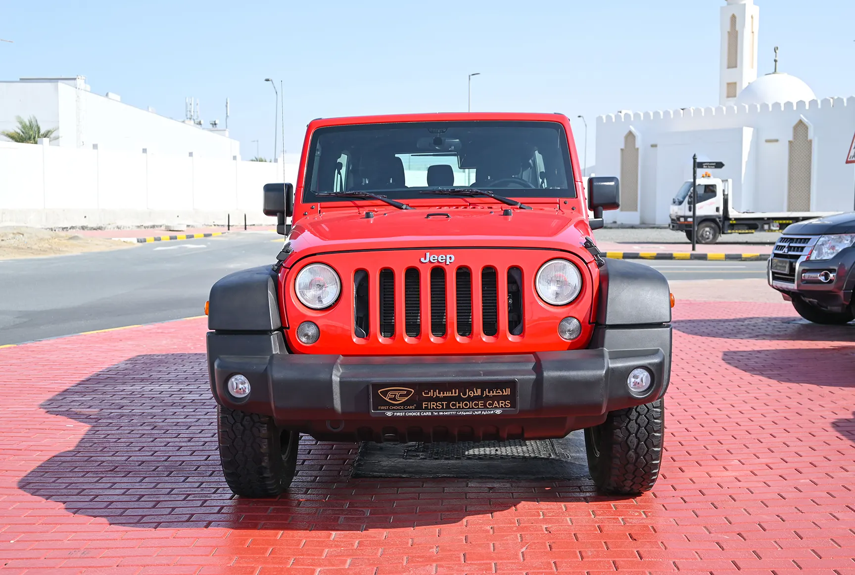 Used 2016 Jeep Wrangler Unlimited Sport Red – Front View at First Choice Cars Sharjah
