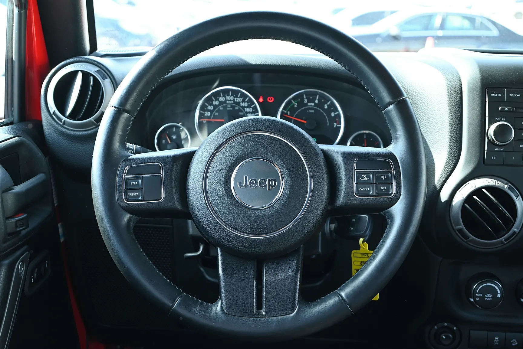 Used 2016 Jeep Wrangler Unlimited Sport Red – Driver Side Dashboard & Steering View at First Choice Cars Sharjah