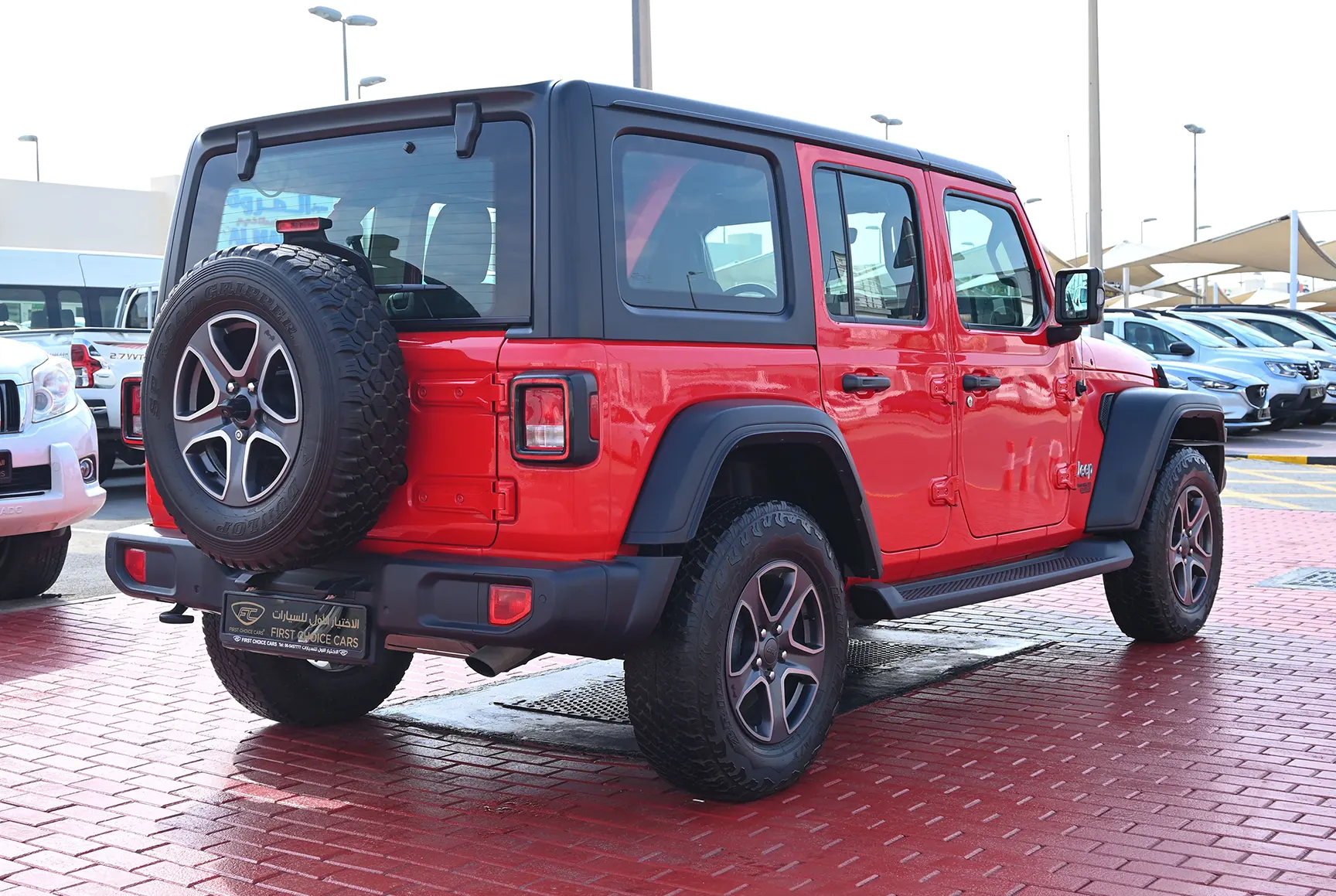 Used 2019 Jeep Wrangler Unlimited Sport Red – Right Back Diagonal (45°) View at First Choice Cars Sharjah