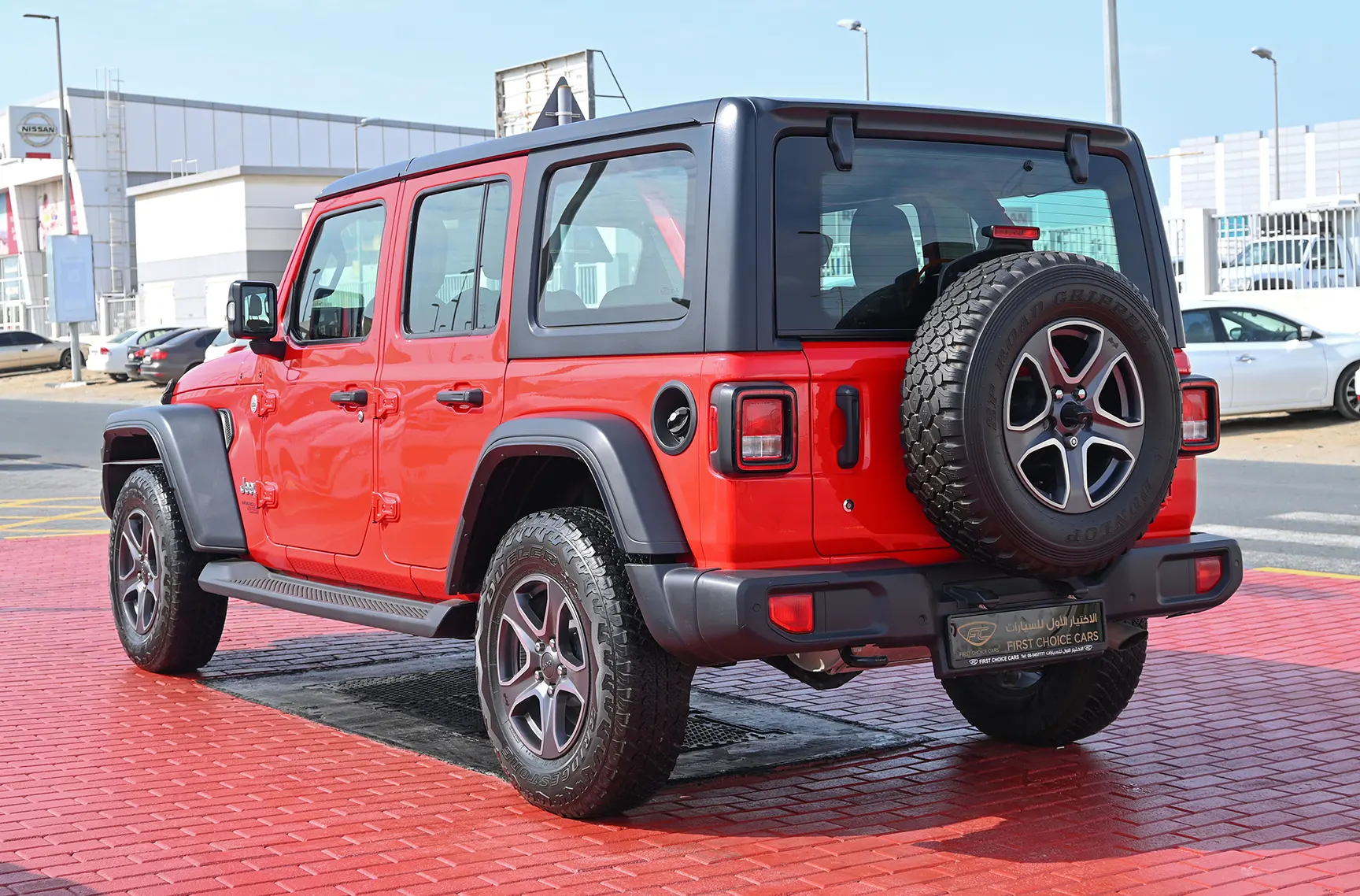Used 2019 Jeep Wrangler Unlimited Sport Red – Left Back Diagonal (45°) View at First Choice Cars Sharjah
