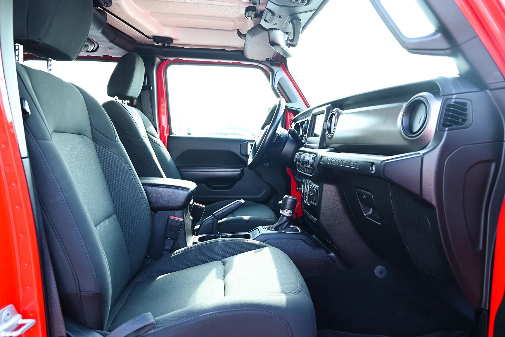 Used 2019 Jeep Wrangler Unlimited Sport Red – Front Passenger Side Cabin View at First Choice Cars Sharjah