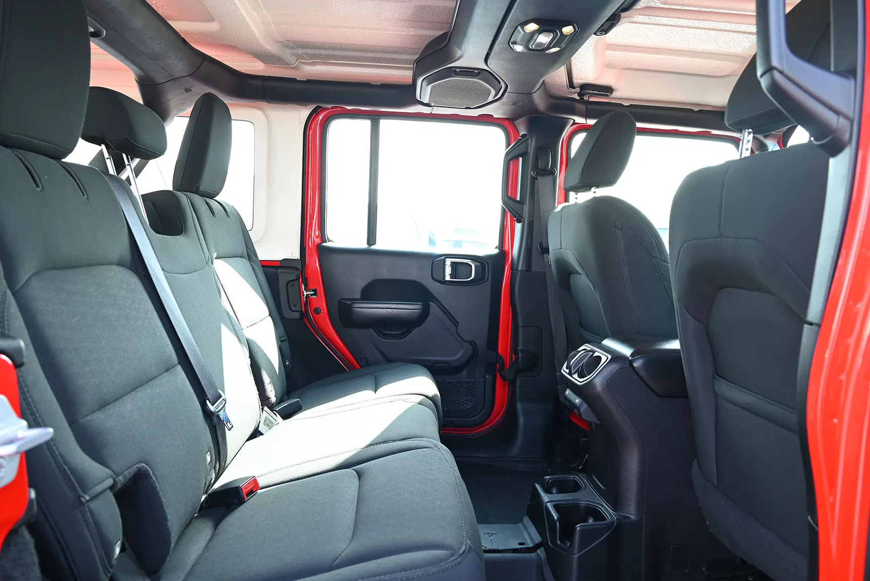 Used 2019 Jeep Wrangler Unlimited Sport Red – Rear Passenger Side Cabin View at First Choice Cars Sharjah