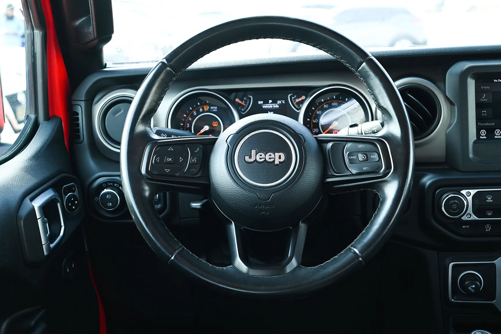 Used 2019 Jeep Wrangler Unlimited Sport Red – Driver Side Dashboard & Steering View at First Choice Cars Sharjah