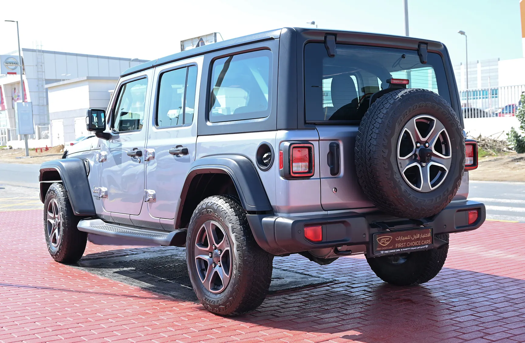 Used 2019 Jeep Wrangler Unlimited Sport Silver – Left Back Diagonal (45°) View at First Choice Cars Sharjah