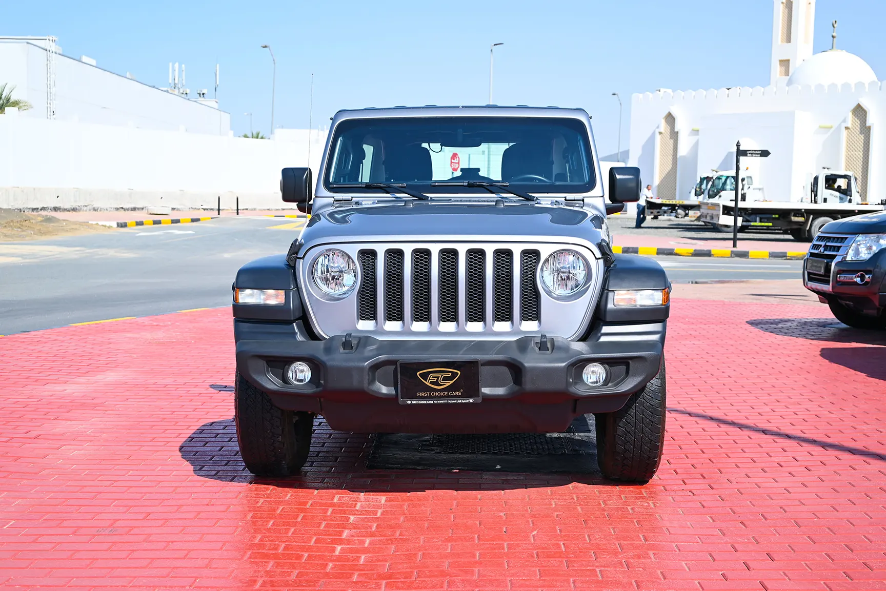 Used 2019 Jeep Wrangler Unlimited Sport Silver – Front View at First Choice Cars Sharjah