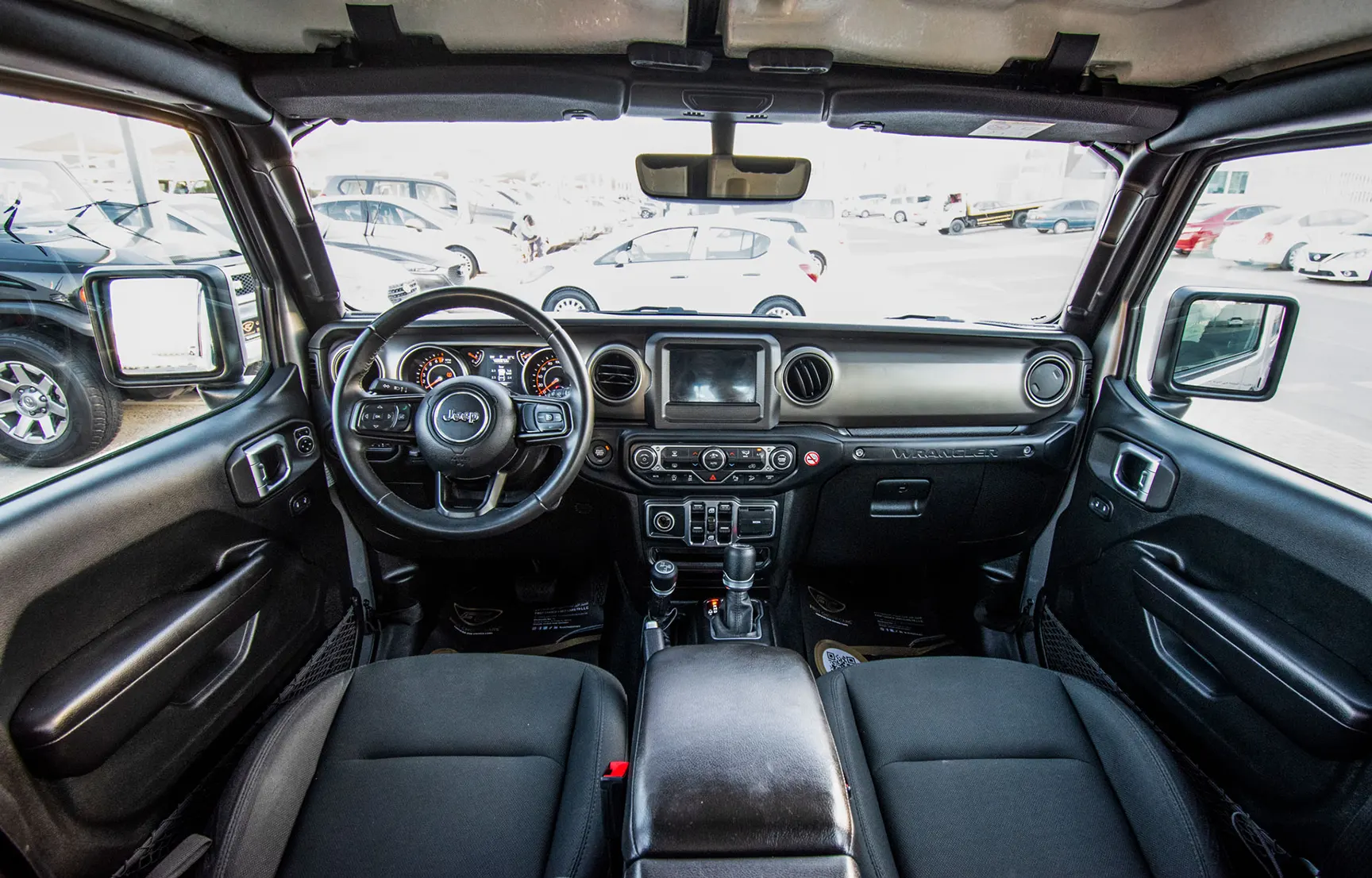 Used 2019 Jeep Wrangler Unlimited Sport Silver – Front Cabin / Dashboard Full View at First Choice Cars Sharjah