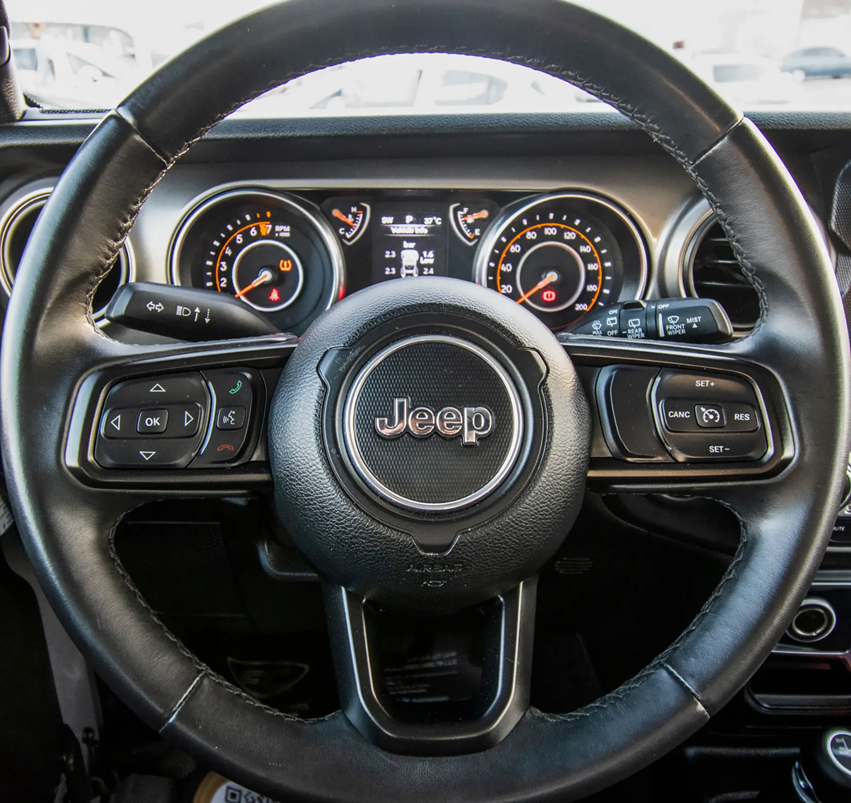 Used 2019 Jeep Wrangler Unlimited Sport Silver – Driver Side Dashboard & Steering View at First Choice Cars Sharjah