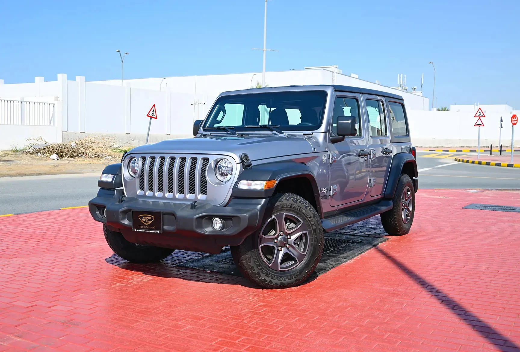 Used 2019 Jeep Wrangler Unlimited Sport Silver – Left Front Diagonal (45°) View at First Choice Cars Sharjah