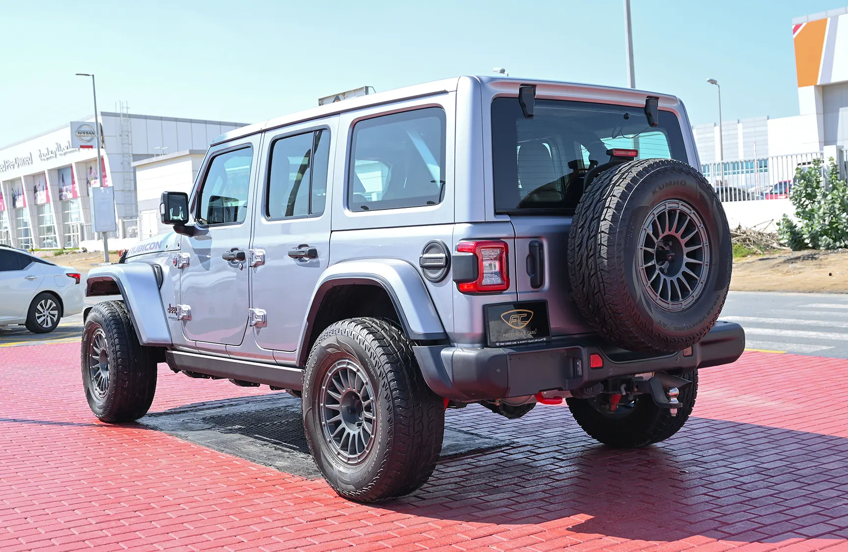Used 2020 Jeep Wrangler Unlimited Rubicon Silver – Left Back Diagonal (45°) View at First Choice Cars Sharjah