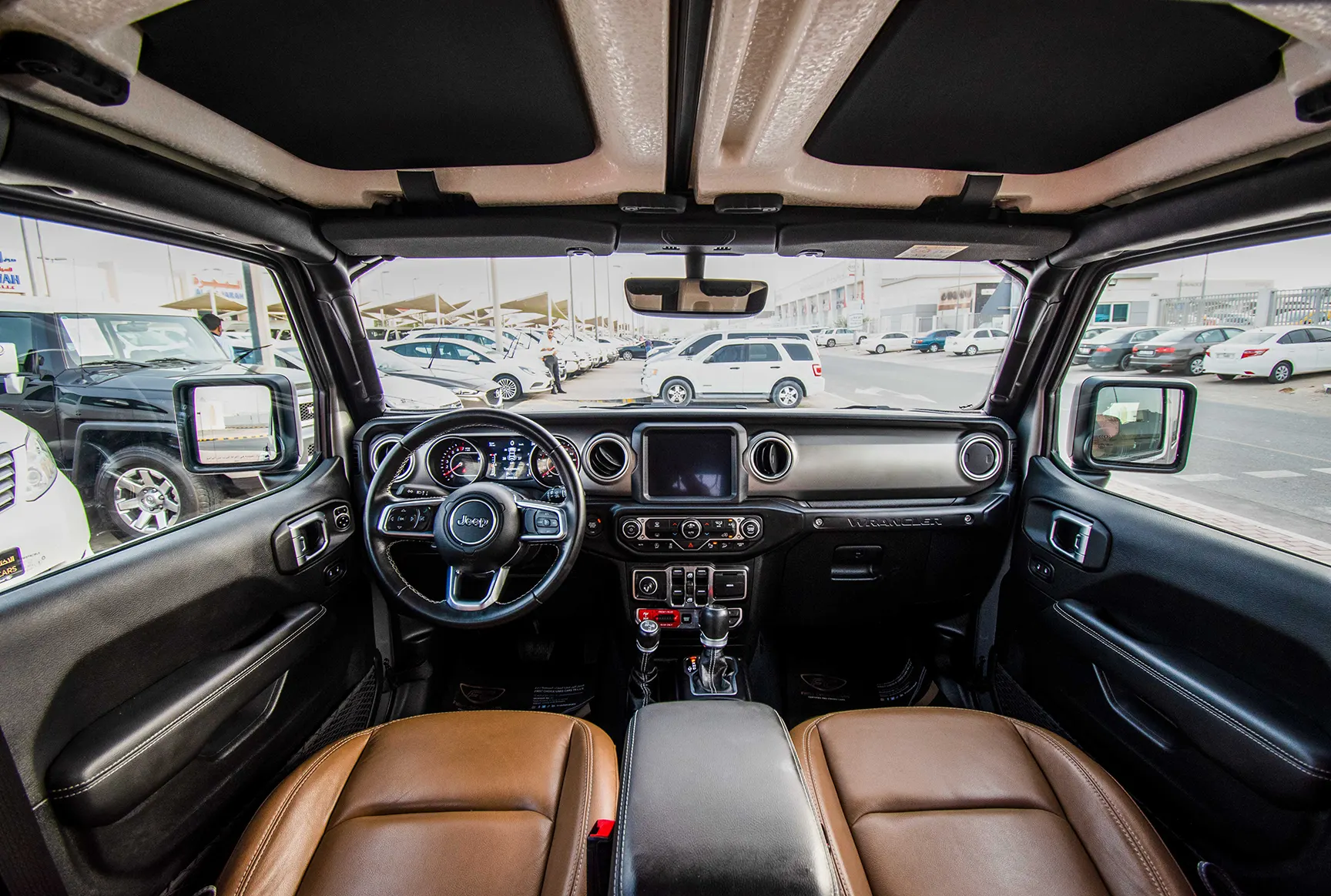 Used 2020 Jeep Wrangler Unlimited Rubicon Silver – Front Cabin / Dashboard Full View at First Choice Cars Sharjah