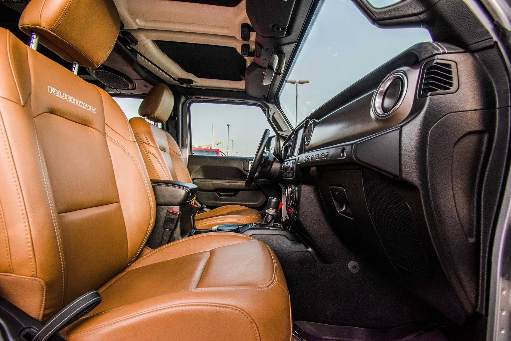 Used 2020 Jeep Wrangler Unlimited Rubicon Silver – Front Passenger Side Cabin View at First Choice Cars Sharjah