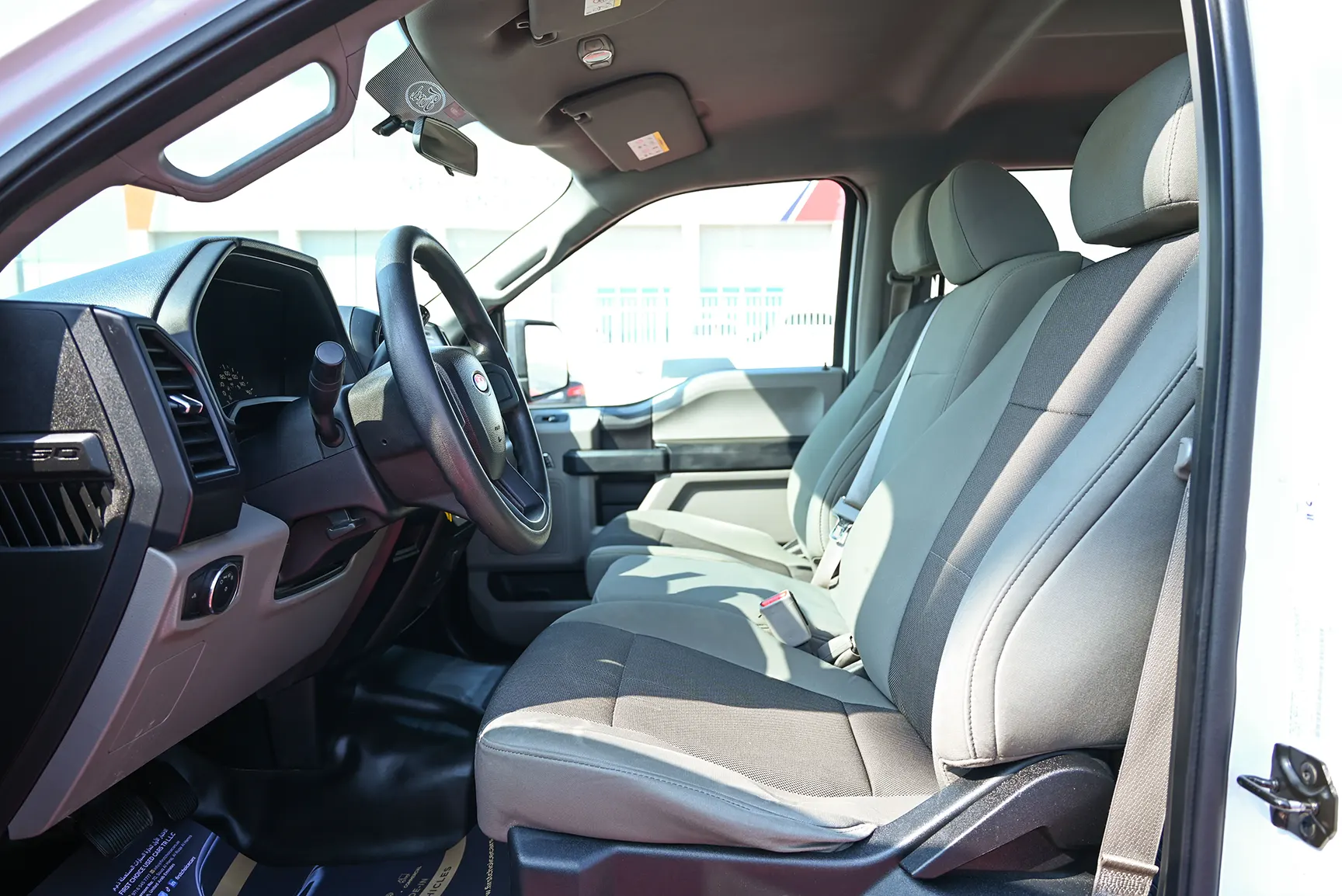 Used 2016 Ford F-Series Pickup F-150 XLT White – Front Driver Side Cabin View at First Choice Cars Sharjah