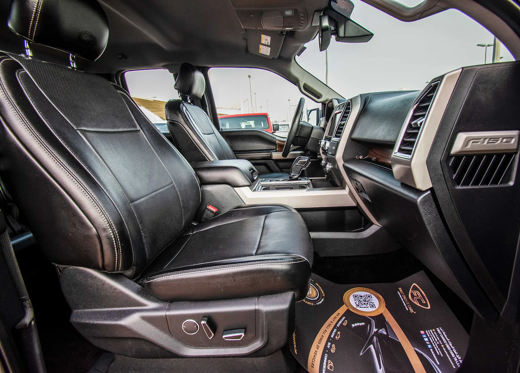 Used 2017 Ford F-Series Pickup F-150 Lariat Sport Edition in Black – Front Passenger Side Cabin View for Sale at First Choice Cars Dubai Sharjah