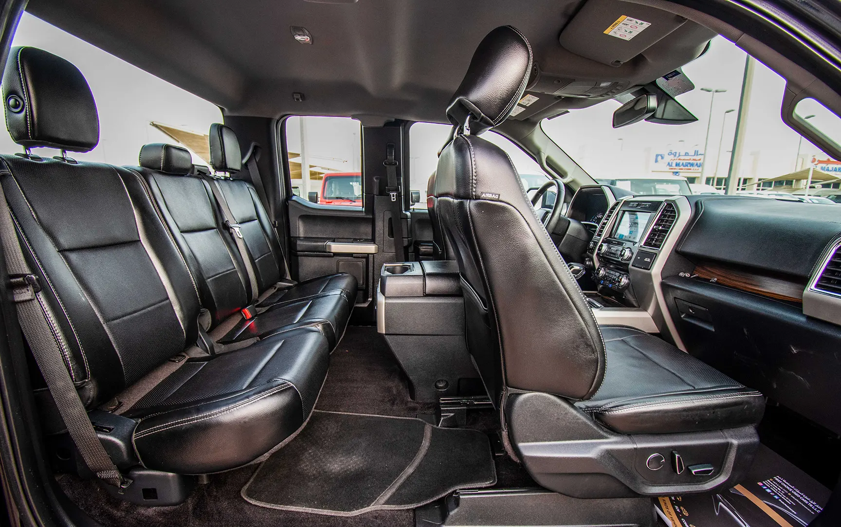 Used 2017 Ford F-Series Pickup F-150 Lariat Sport Edition in Black – Rear Passenger Side Cabin View for Sale at First Choice Cars Dubai Sharjah