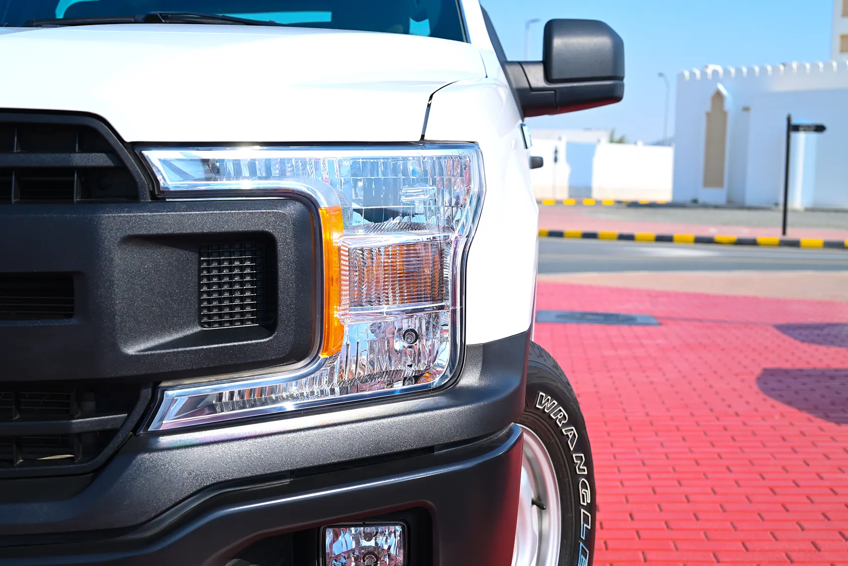 Used 2020 Ford F-Series Pickup F-150 XLT White – Headlight Close-up at First Choice Cars Sharjah