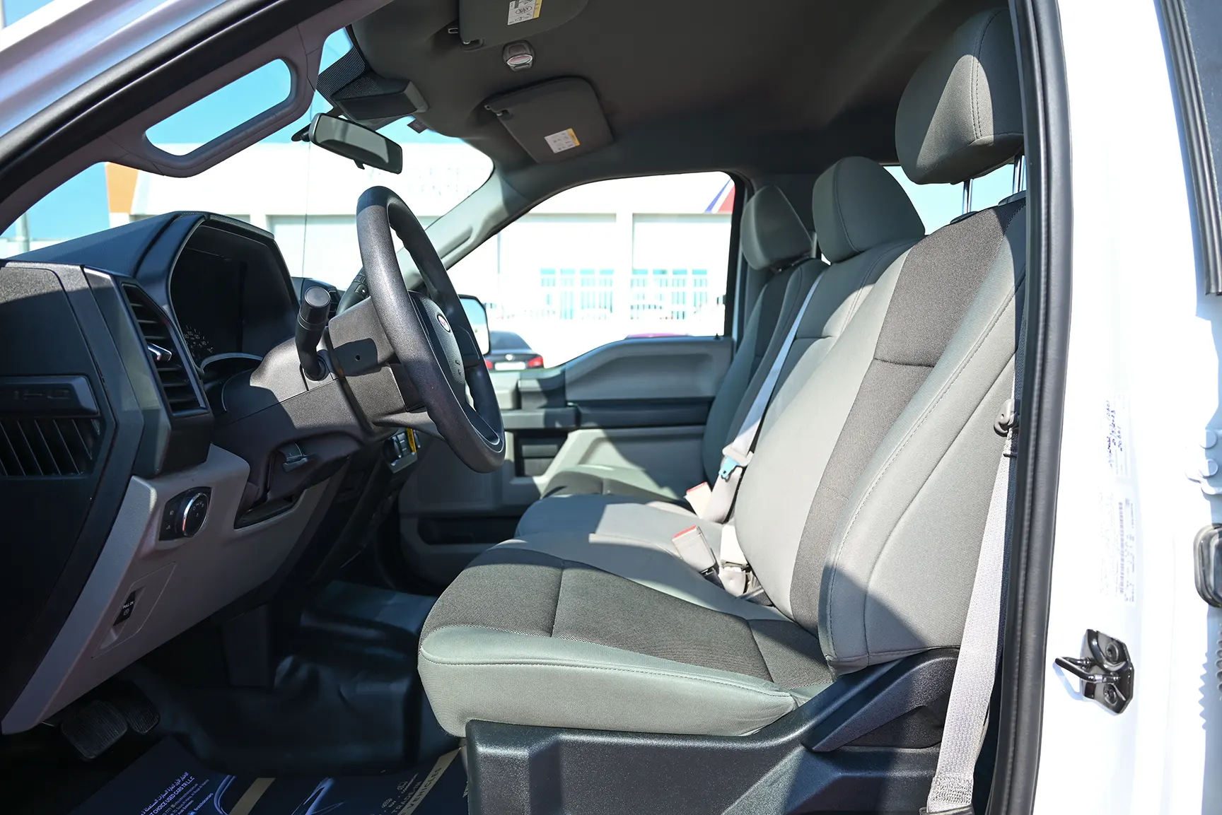 Used 2020 Ford F-Series Pickup F-150 XLT White – Front Driver Side Cabin View at First Choice Cars Sharjah