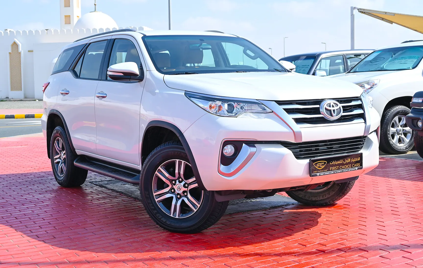 Used 2017 Toyota Fortuner 4.0L Gxr White – Right Front Diagonal (45°) View at First Choice Cars Sharjah