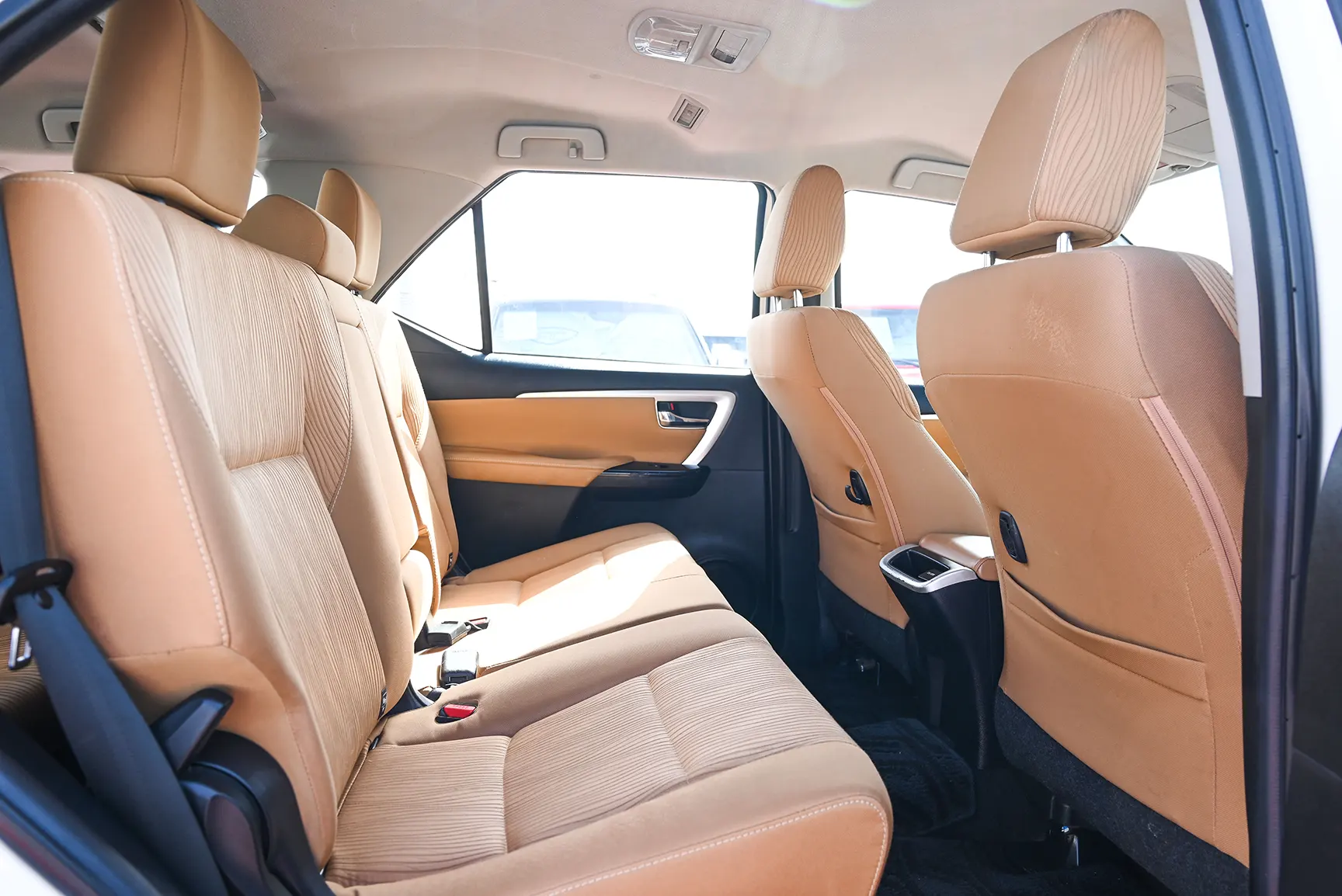 Used 2017 Toyota Fortuner 4.0L Gxr White – Rear Passenger Side Cabin View at First Choice Cars Sharjah