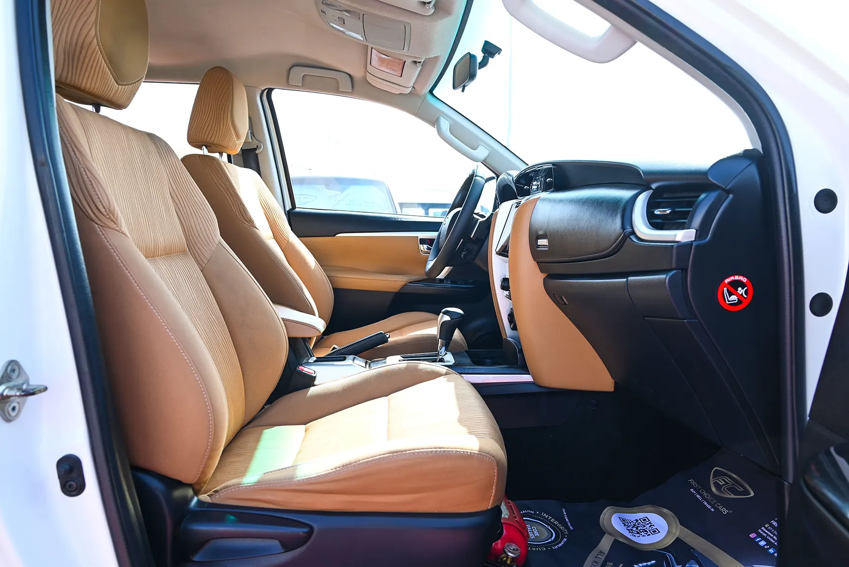 Used 2017 Toyota Fortuner GXR in White – Front Passenger Side Cabin View for Sale at First Choice Cars Dubai Sharjah