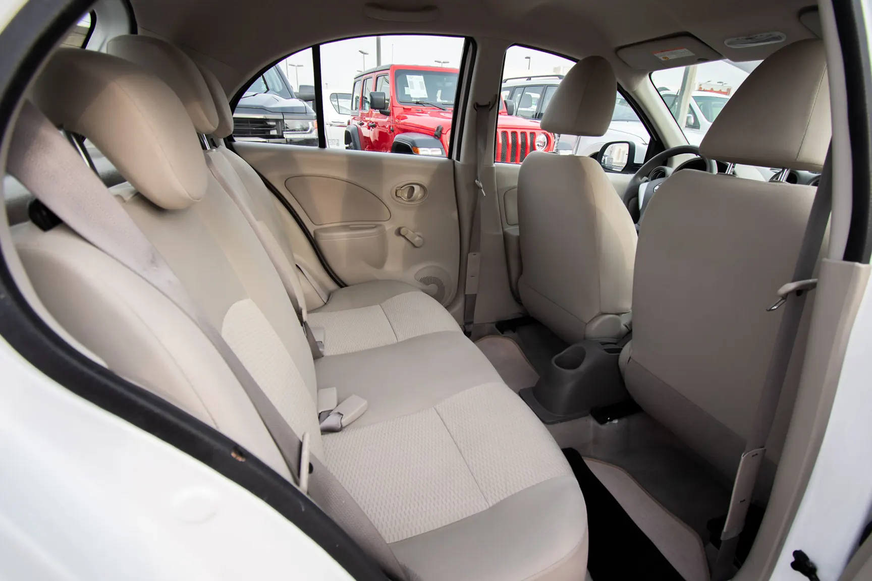Used 2020 Nissan Micra S White – Rear Passenger Side Cabin View at First Choice Cars Sharjah