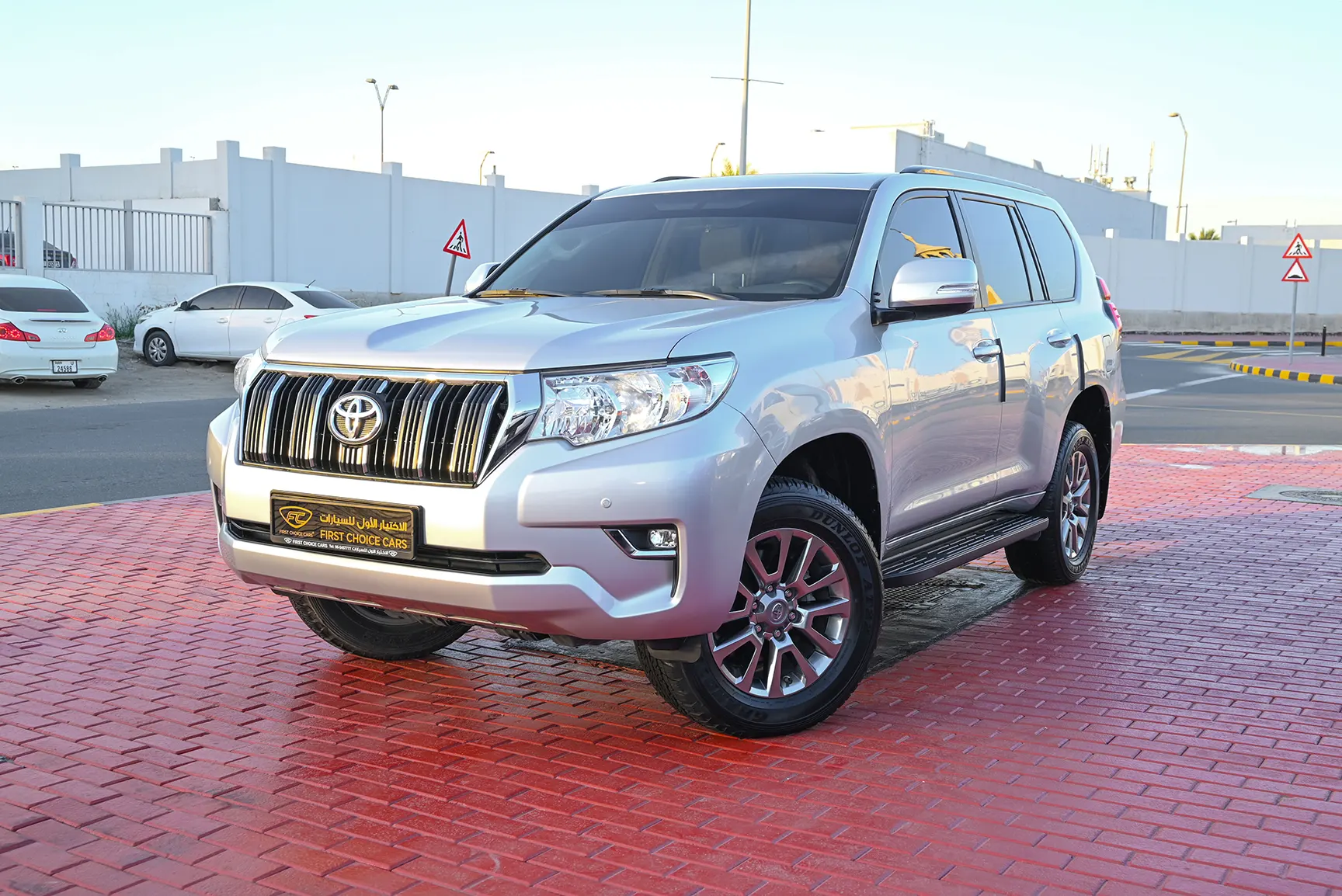 Used 2021 Toyota Prado GXR White – Left Front Diagonal (45°) View at First Choice Cars Sharjah