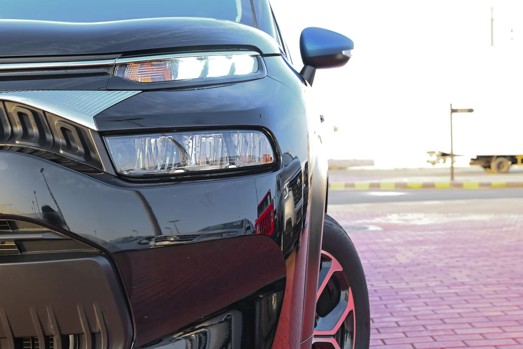 Used 2022 Citroen C3 Aircross Live Black – Headlight Close-up at First Choice Cars Sharjah