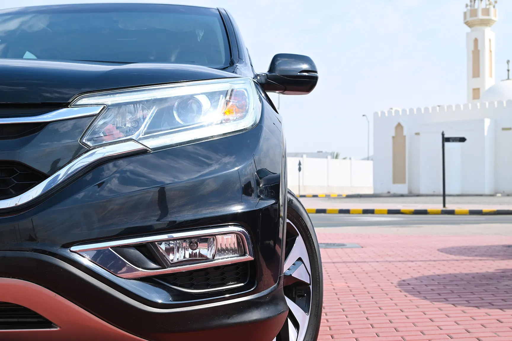 Used 2016 Honda CR-V EXL in Black – Headlight Close-up for Sale at First Choice Cars Dubai Sharjah