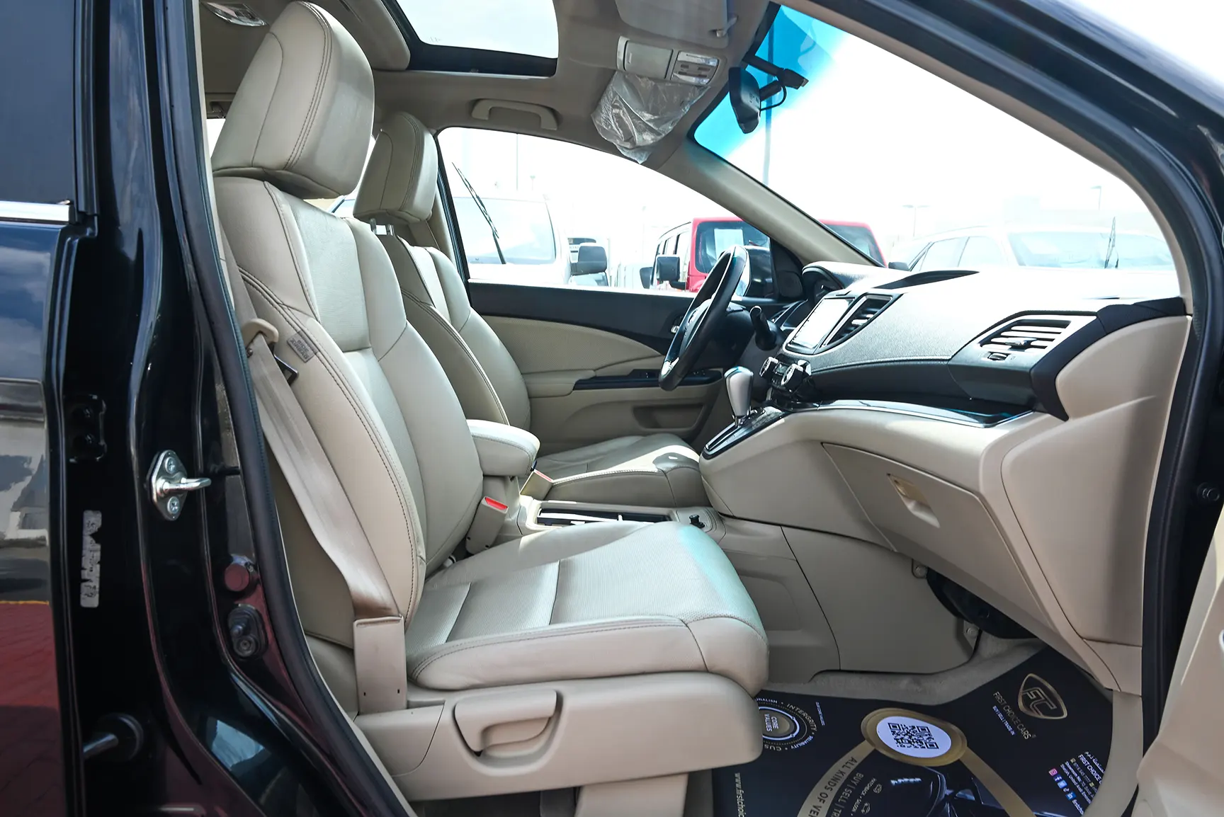 Used 2016 Honda CR-V EXL in Black – Front Passenger Side Cabin View for Sale at First Choice Cars Dubai Sharjah