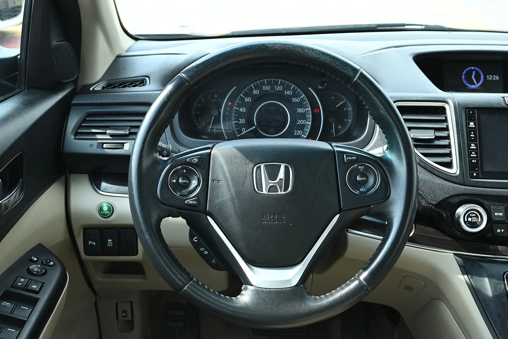 Used 2016 Honda CR-V EXL in Black – Driver Side Dashboard & Steering View for Sale at First Choice Cars Dubai Sharjah