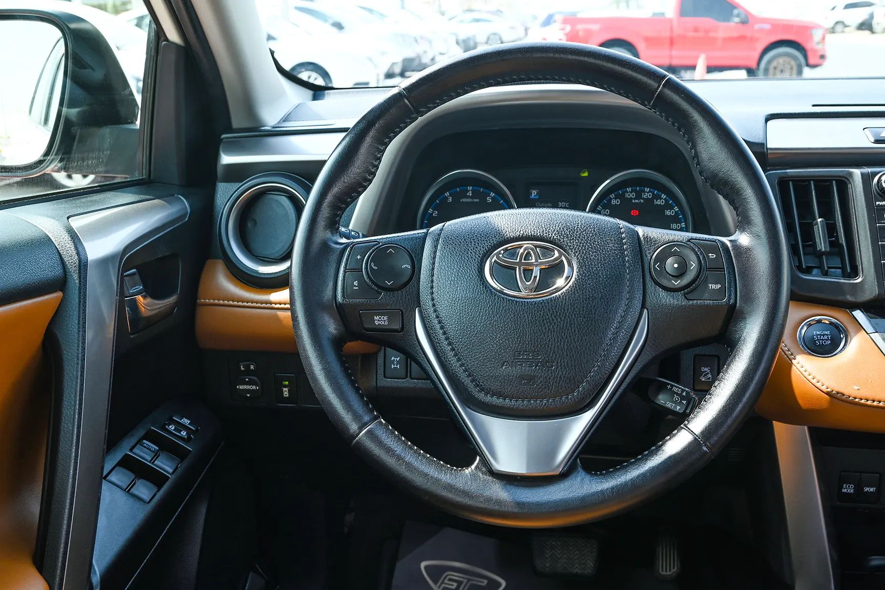 Used 2017 Toyota RAV4 VXR in White – Driver Side Dashboard & Steering View for Sale at First Choice Cars Dubai Sharjah
